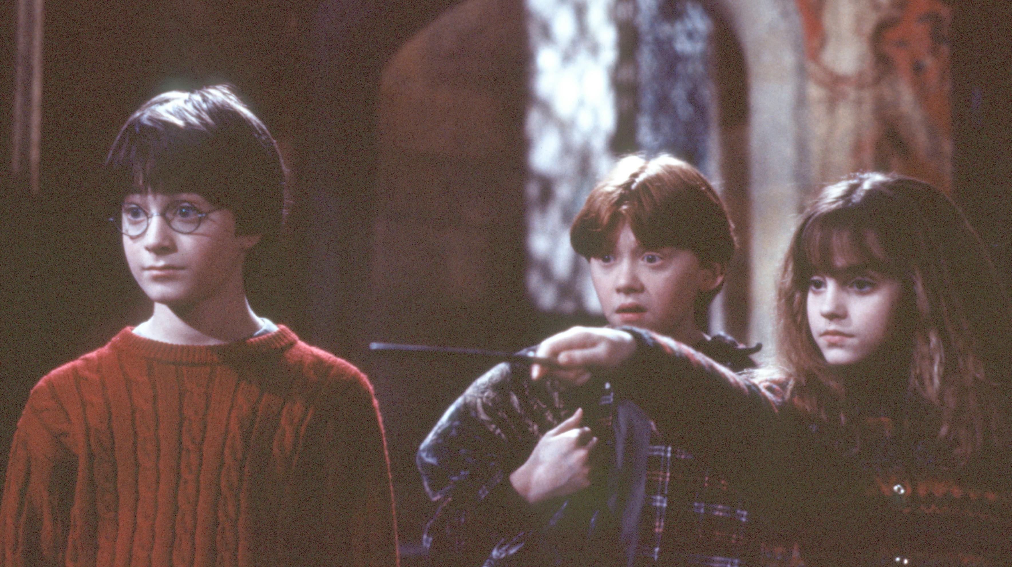 Daniel Radcliffe, Rupert Grint og Emma Watson i rollerne som Harry Potter, Ron Weasley og Hermione Granger.