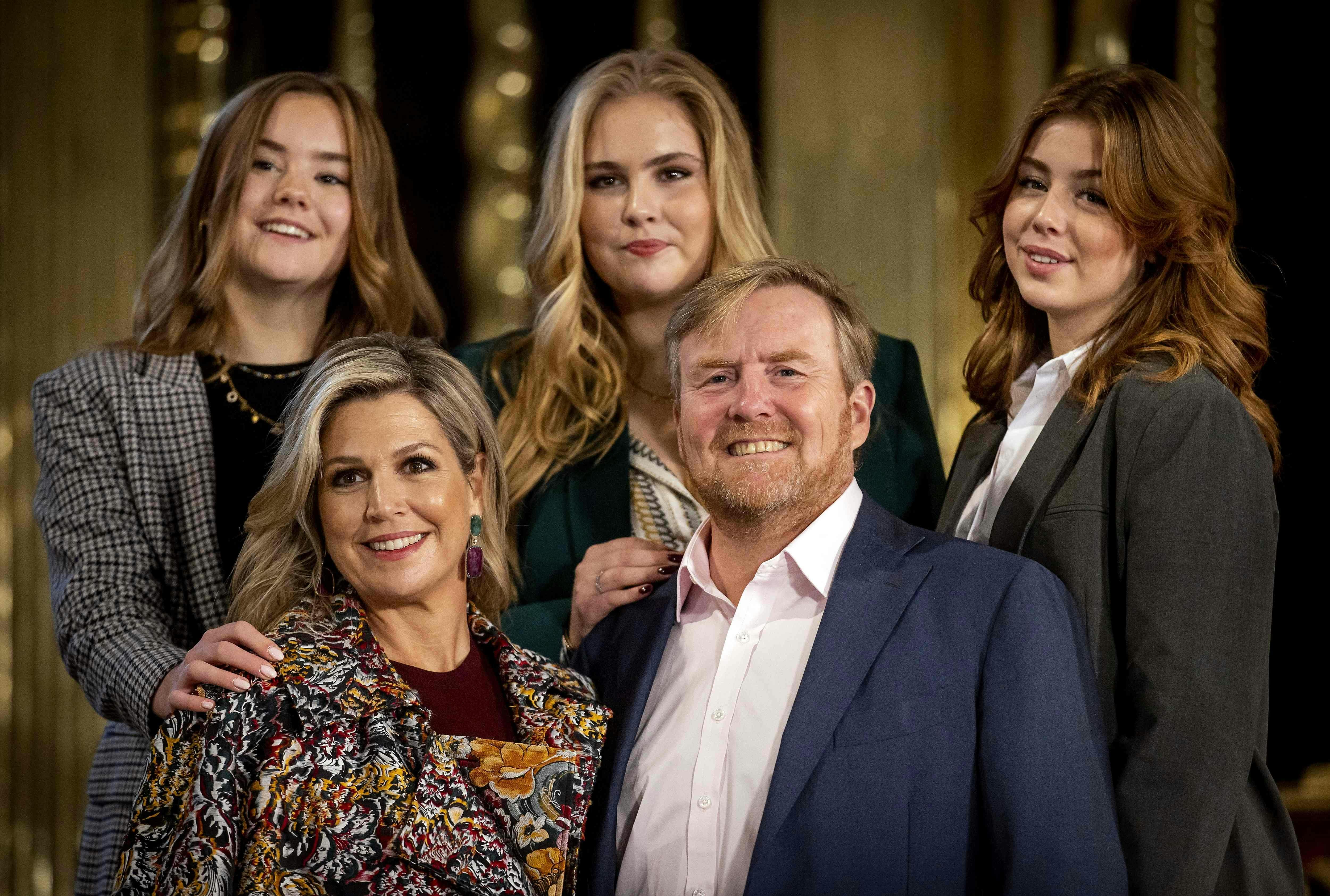 Dutch King Willem-Alexander (2nd R) and Queen Maxima (2nd L) pose with Princesses Ariane (L), Alexia (R) and Amalia (C) during the photo session of the royal family at the Nieuwe Kerk in Amsterdam, on November 4, 2022. (Photo by Koen van Weel / ANP / AFP) / Netherlands OUT