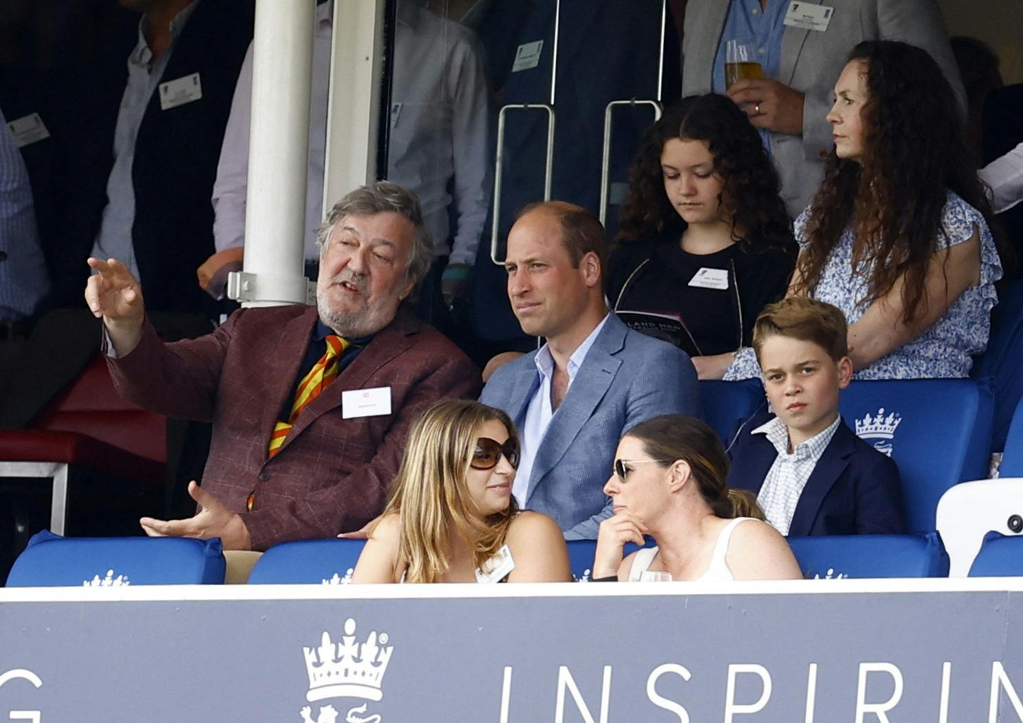Cricket - Ashes - Second Test - England v Australia - Lords, London, Britain - July 1, 2023 President of Marylebone Cricket Club (MCC) Stephen Fry is pictured in the stands with Britain's Prince William, Prince of Wales and Prince George during the match Action Images via Reuters/Peter Cziborra