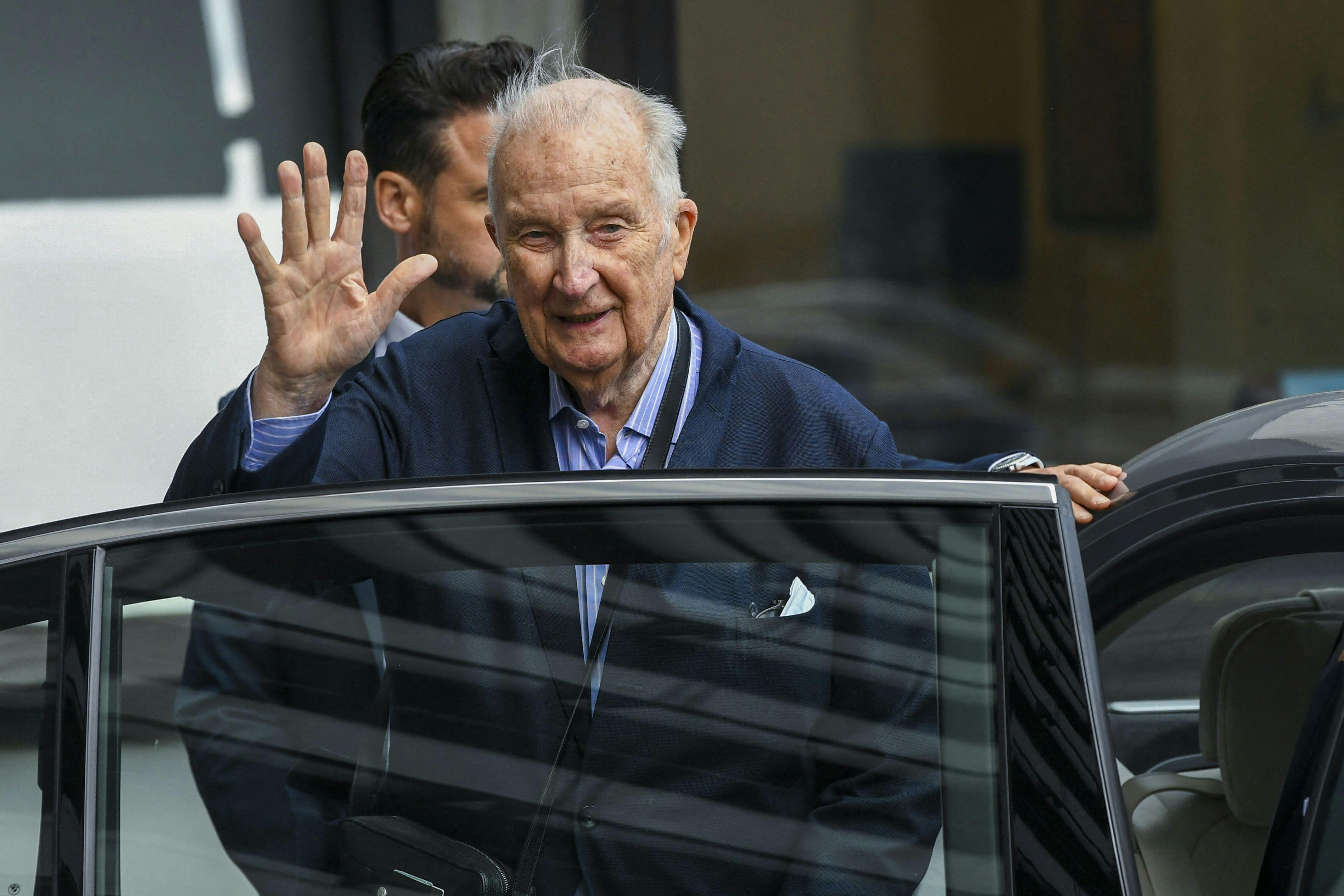 King Albert II of Belgium waves as the King leaves the Saint-Luc hospital in Brussels, on July 5, 2023. Eighty-nine year-old King Albert II left hospital, a week after he was admitted to the hospital with dehydration symptoms. (Photo by FREDERIC SIERAKOWSKI / Belga / AFP) / Belgium OUT