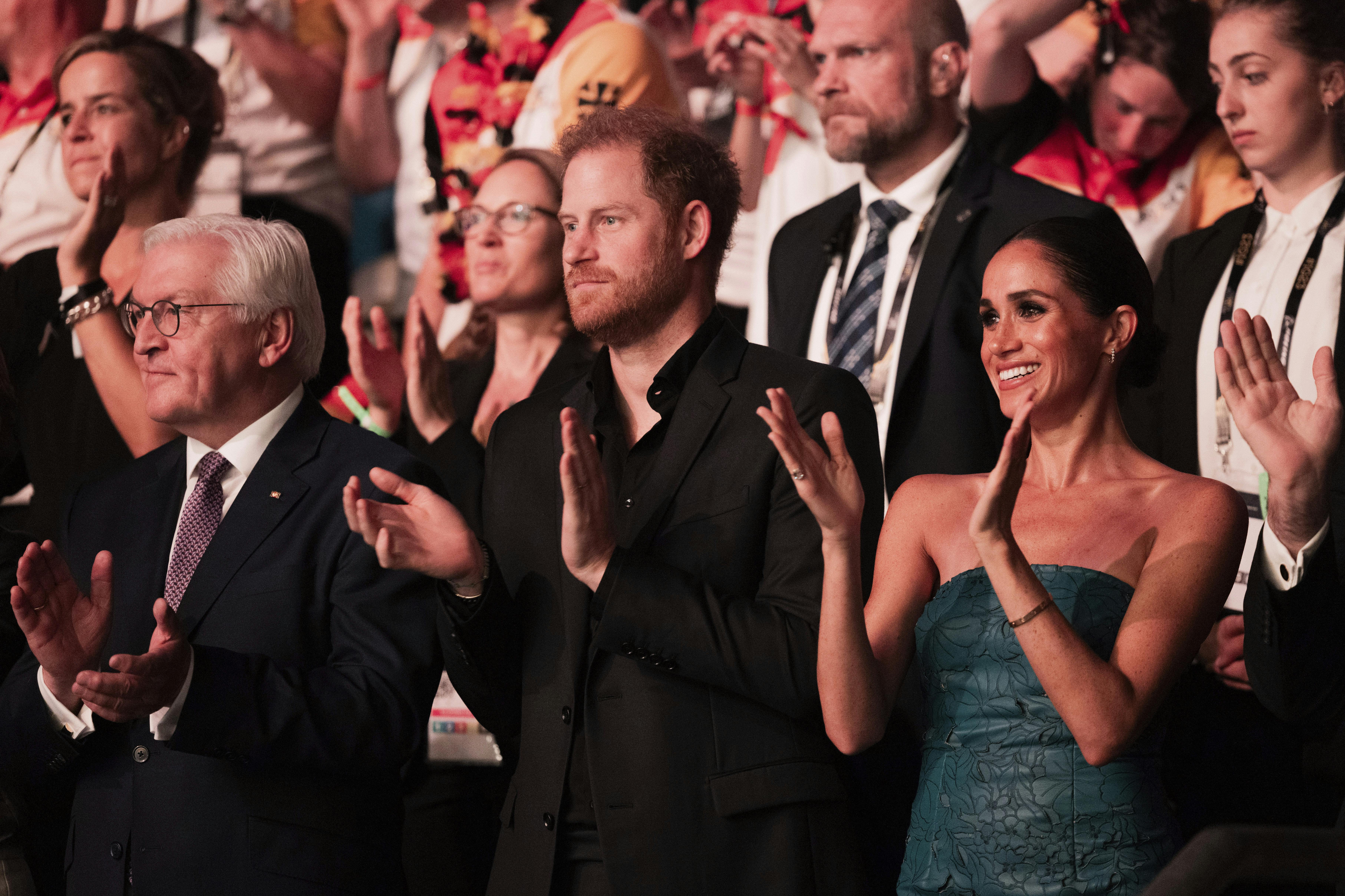 16 September 2023, North Rhine-Westphalia, Duesseldorf: Prince Harry (M), Duke of Sussex, and his wife Meghan, Duchess of Sussex, and German President Frank-Walter Steinmeier attend the closing ceremony of the 6th Invictus Games at the Merkur Spiel Arena. The Paralympic competition for war-disabled athletes was hosted in Germany for the first time. Photo by: Rolf Vennenbernd/picture-alliance/dpa/AP Images