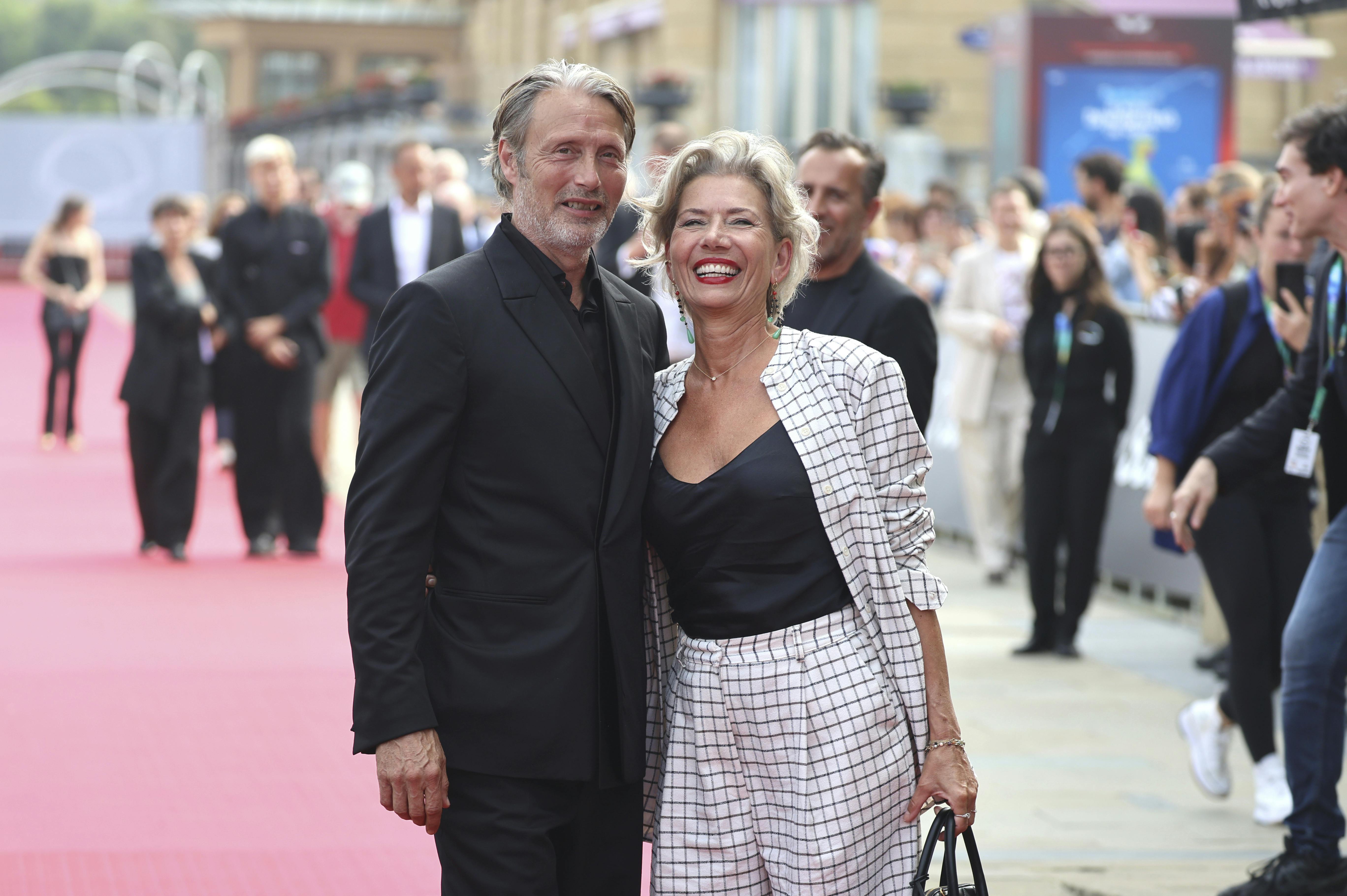 Mads Mikkelsen and his wife, Hanne Jacobsen, pose upon arrival on the red carpet for 'The Promised Land' at the San Sebastian Film Festival, Sept. 26, 2023, in San Sebastian, Spain. PRESENTATION Raúl Terrel / Europa Press 09/26/2023 (Europa Press via AP)