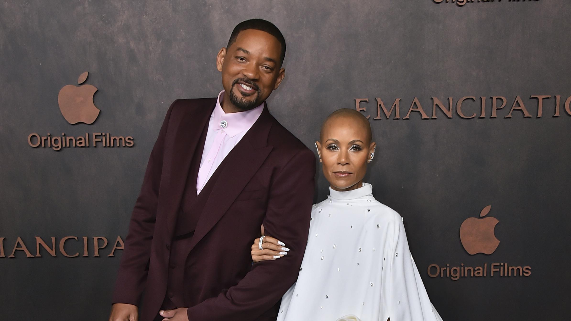 Will Smith, left, and Jada Pinkett Smith arrive at the premiere of "Emancipation, " Wednesday, Nov. 30, 2022, at the Regency Village Theatre in Los Angeles. (Photo by Jordan Strauss/Invision/AP)