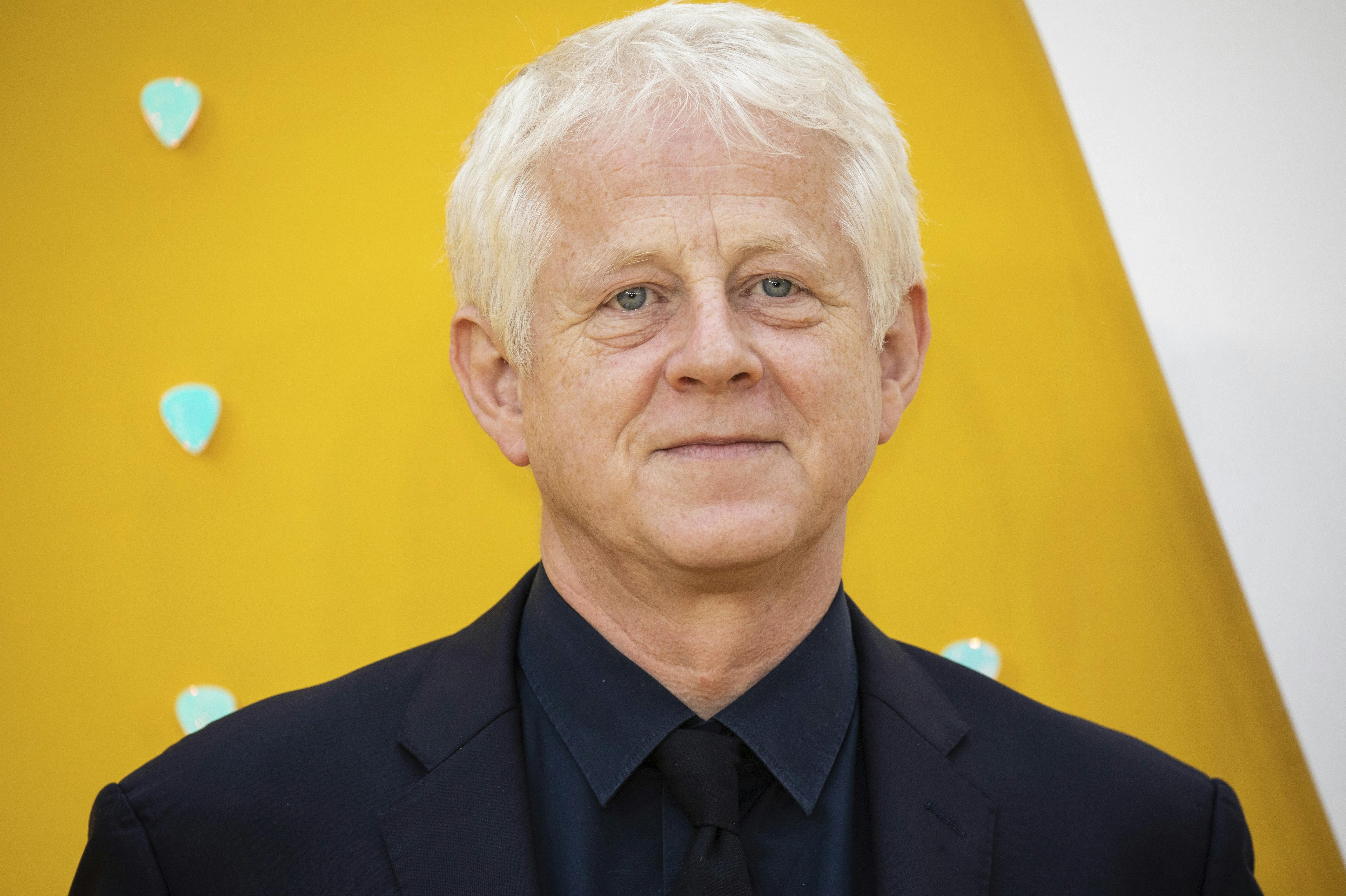 Screenwriter Richard Curtis poses for photographers upon arrival at the premiere of the film 'Yesterday' in London, Tuesday, June 18, 2019. (Photo by Vianney Le Caer/Invision/AP)