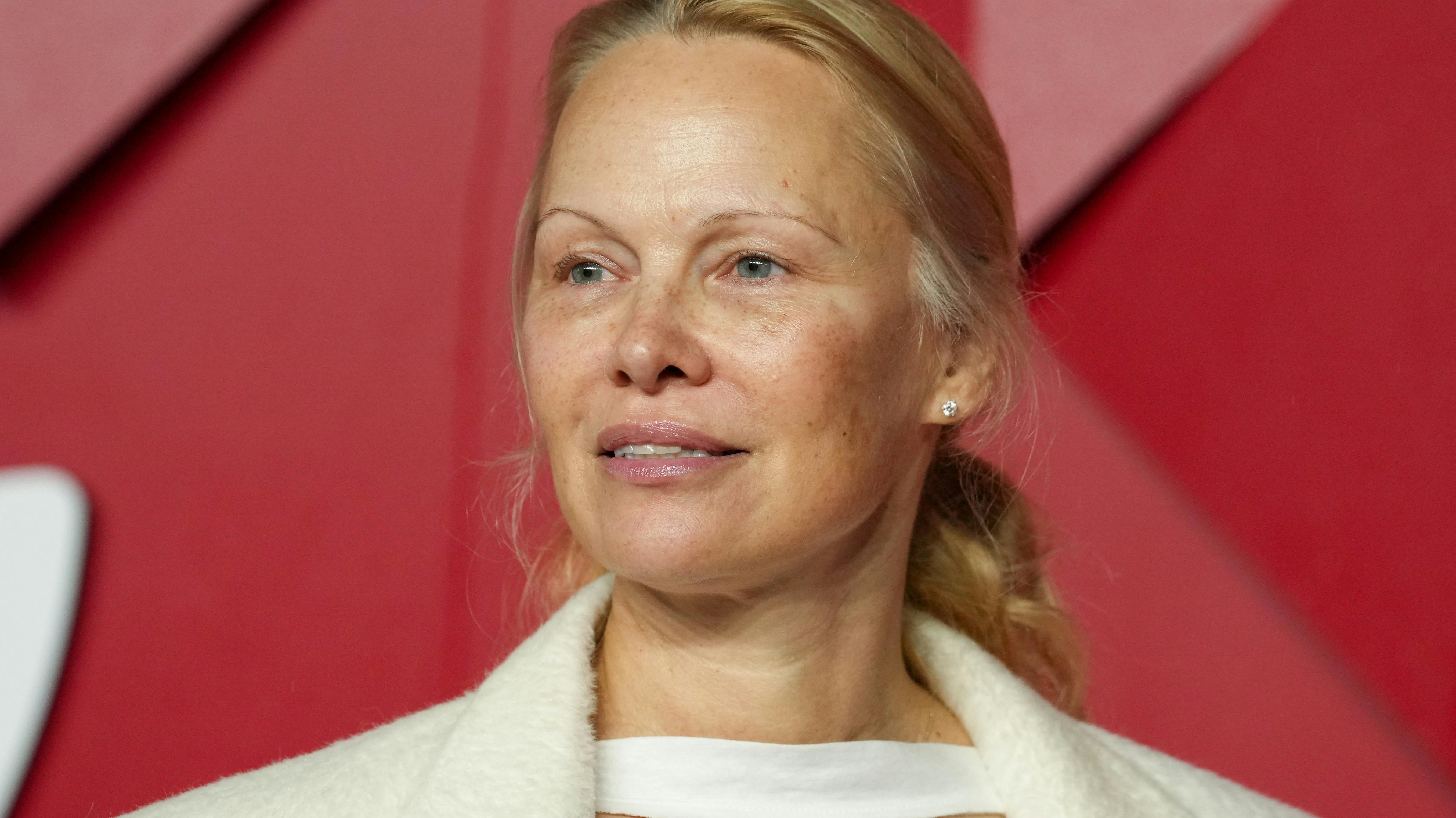 Pamela Anderson poses on the red carpet of the annual Fashion Awards at the Royal Albert Hall in London, Britain, December 4, 2023. REUTERS/Maja Smiejkowska