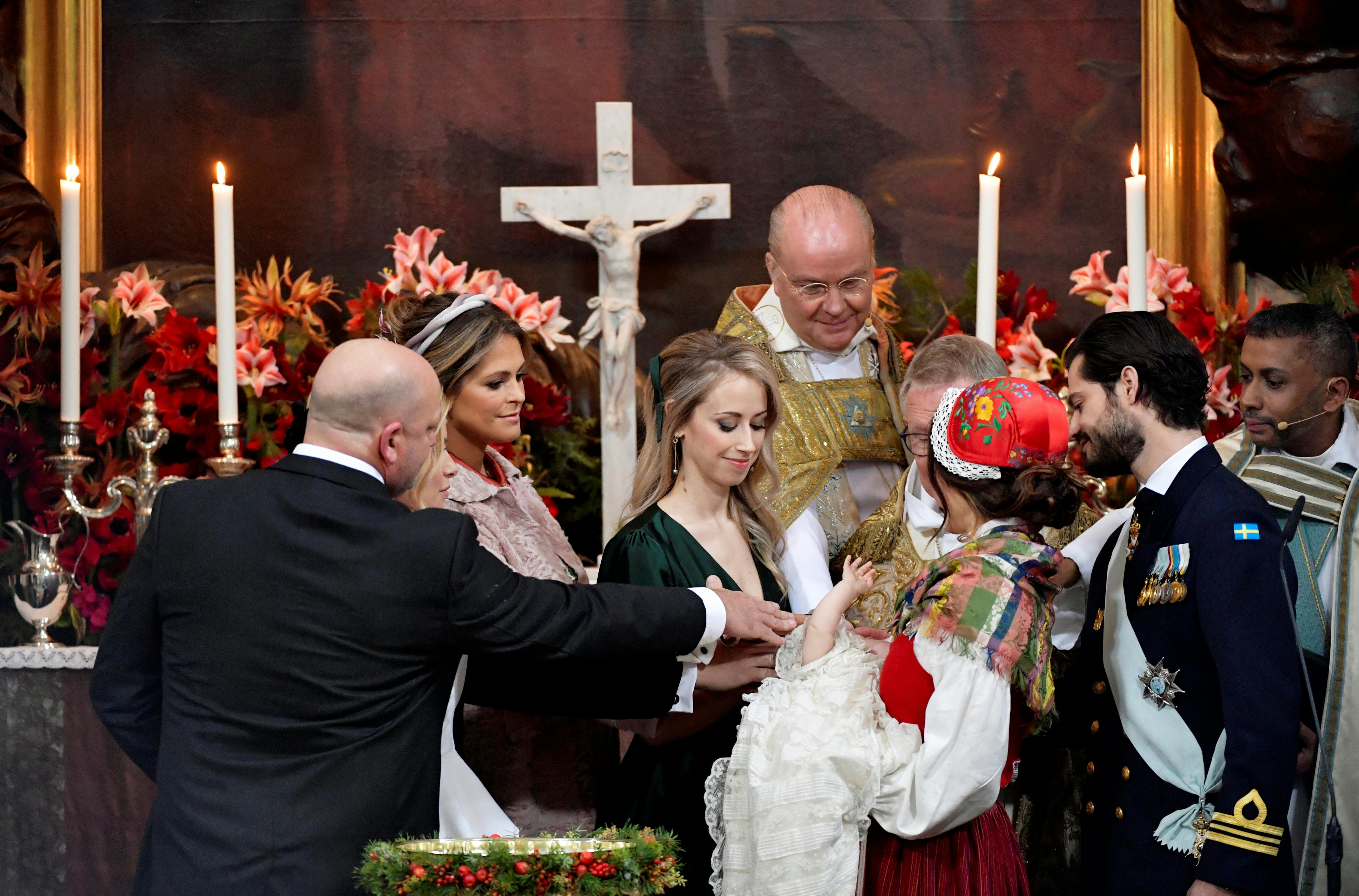 Thomas de Toledo Sommerlath, princess Madeleine of Sweden, Sara Hellqvist, bishop Johan Dalman, archbishop Anders Wejryd, prince Gabriel, princess Sofia, prince Carl Philip and court chaplain Michael Bjerkhagen during prince Gabriel christening in Drottningholm Palace Chapel outside Stockholm, Sweden December 1, 2017. TT News Agency/Anders Wiklund via REUTERS ATTENTION EDITORS - THIS IMAGE WAS PROVIDED BY A THIRD PARTY. SWEDEN OUT.NO COMMERCIAL OR EDITORIAL SALES IN SWEDEN.