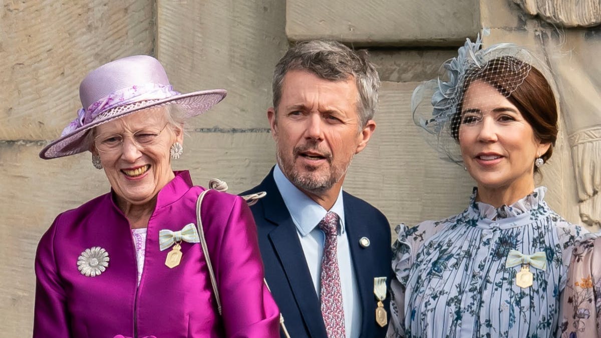 Dronning Margrethe, kronprins Frederik og kronprinsesse Mary.