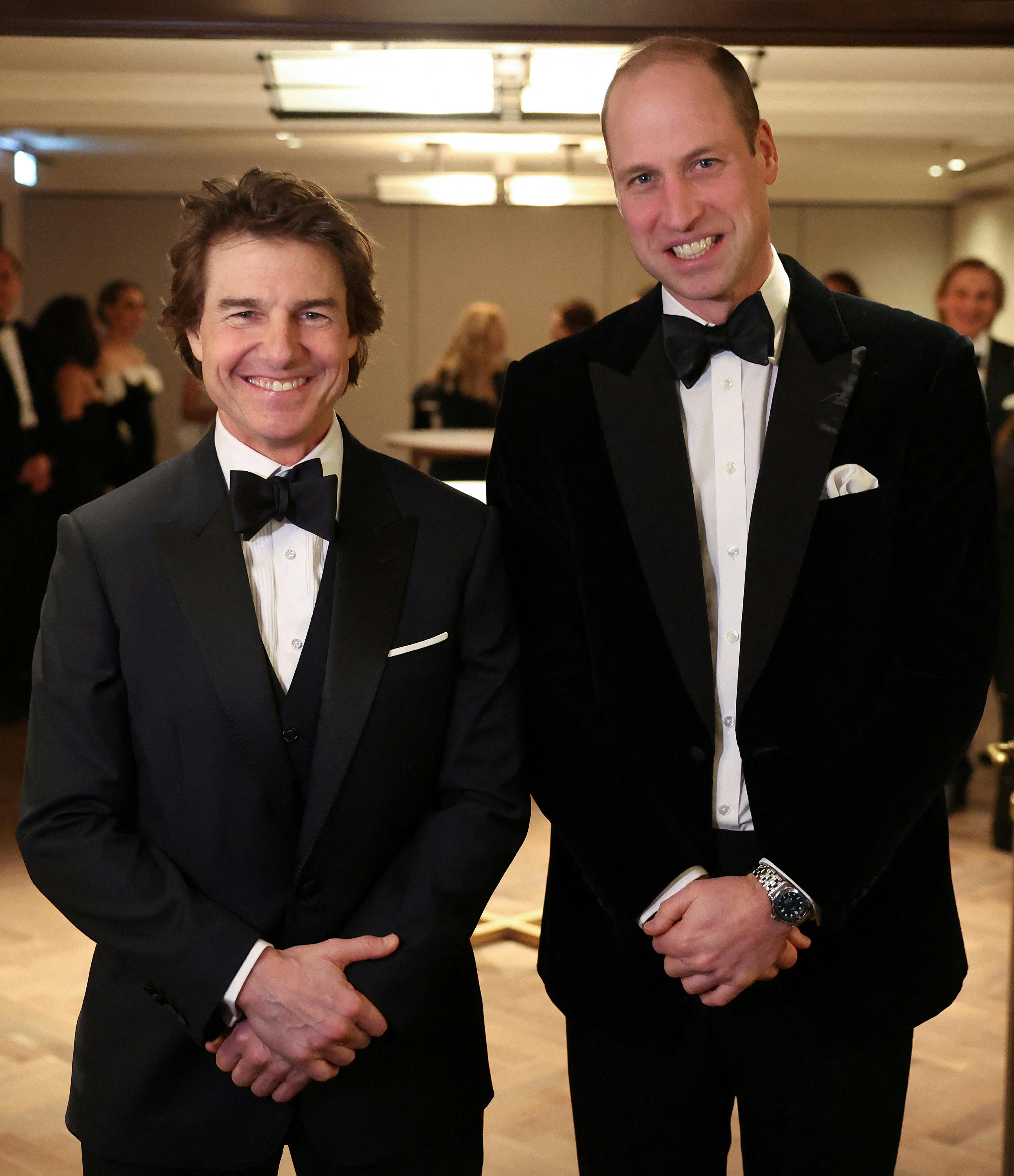 Britain's Prince William, Prince of Wales, poses for a photo with U.S. actor Tom Cruise, at the London Air Ambulance Charity Gala Dinner at The OWO, in central London, Britain, February 7, 2024. DANIEL LEAL/Pool via REUTERS