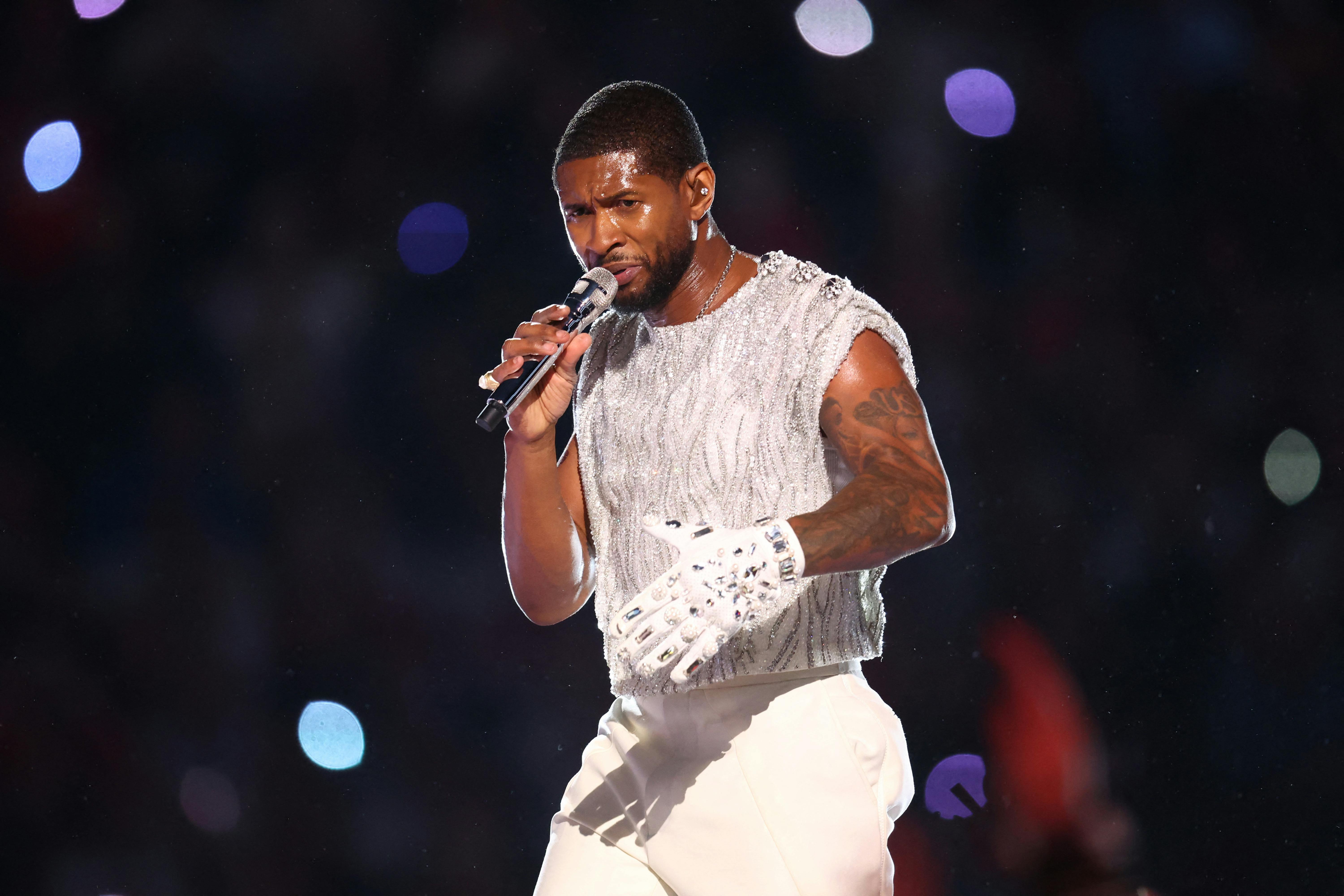 Feb 11, 2024; Paradise, Nevada, USA; Recording artist Usher performs at halftime of Super Bowl LVIII between the Kansas City Chiefs and the San Francisco 49ers at Allegiant Stadium. Mandatory Credit: Mark J. Rebilas-USA TODAY Sports