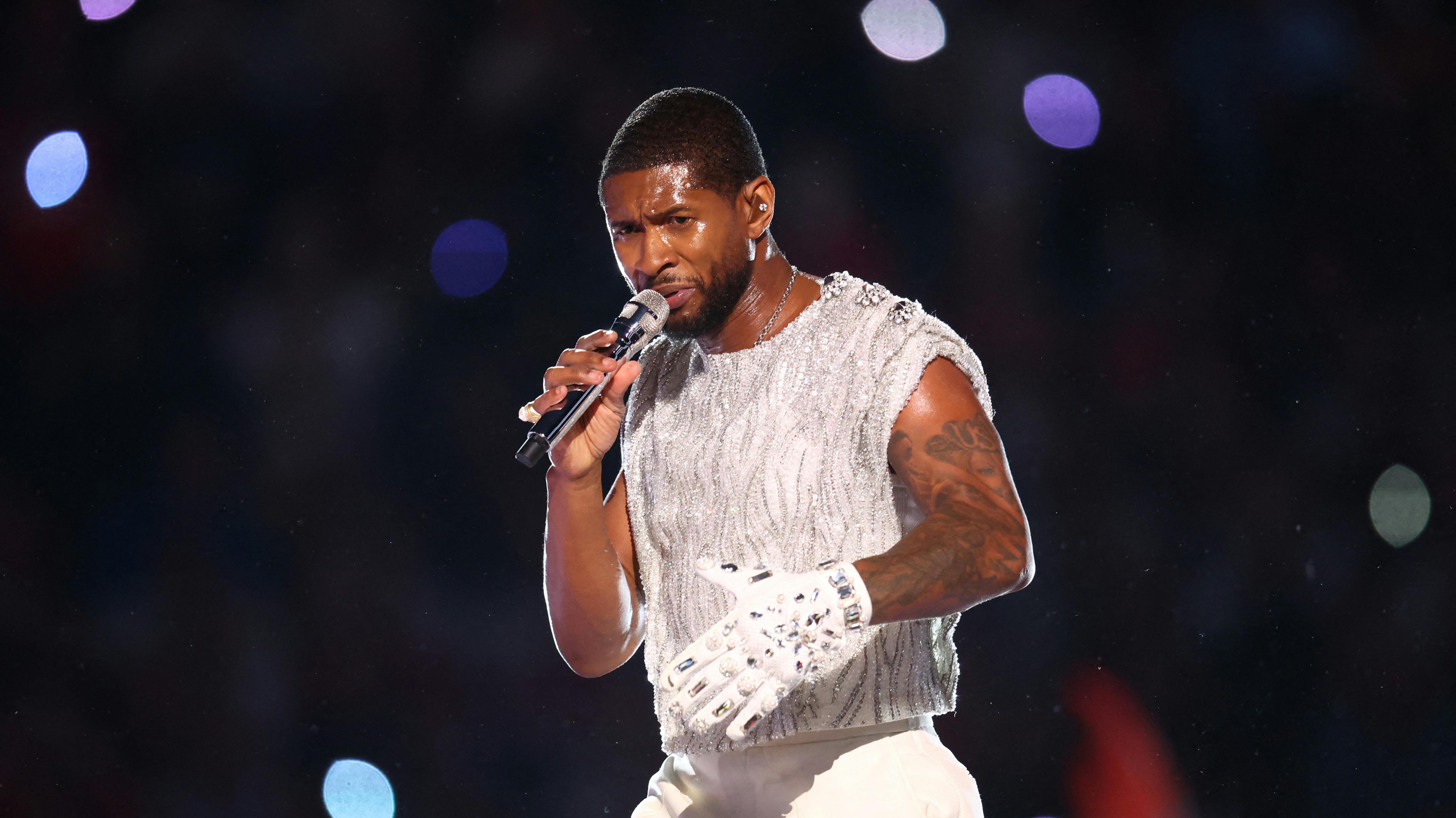Feb 11, 2024; Paradise, Nevada, USA; Recording artist Usher performs at halftime of Super Bowl LVIII between the Kansas City Chiefs and the San Francisco 49ers at Allegiant Stadium. Mandatory Credit: Mark J. Rebilas-USA TODAY Sports