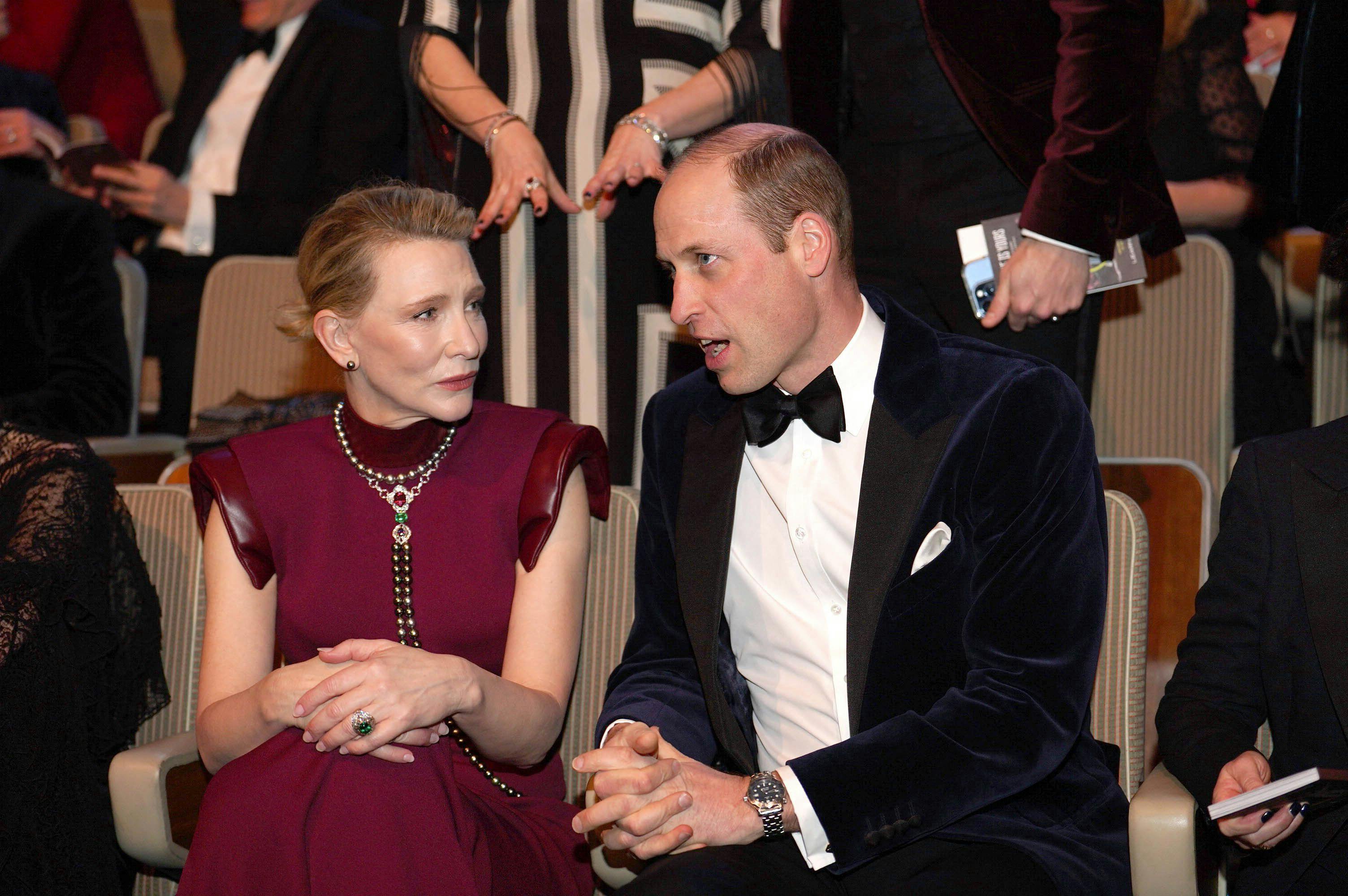 Britain's Prince William, Prince of Wales, president of Bafta, speaks with US-Australian actress Cate Blanchett during the BAFTA British Academy Film Awards at the Royal Festival Hall, Southbank Centre, in London, on February 18, 2024. (Photo by Jordan Pettitt / POOL / AFP)
