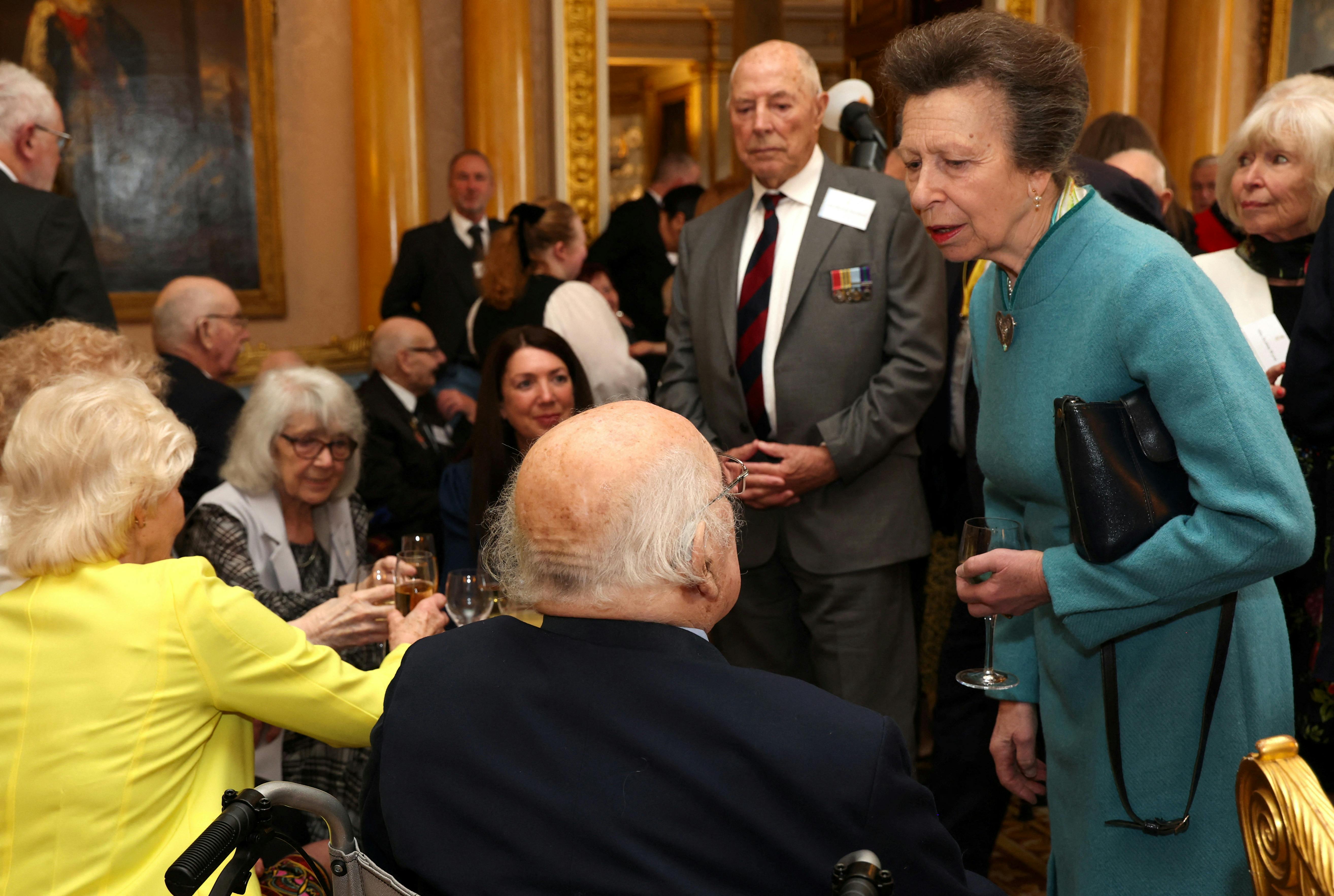 Britain's Princess Anne, Princess Royal, speaks to a war veteran during a reception for Korean War veterans, which they hosted on behalf of Britain's King Charles in London, England, March 19, 2024. Tristan Fewings/Pool via REUTERS