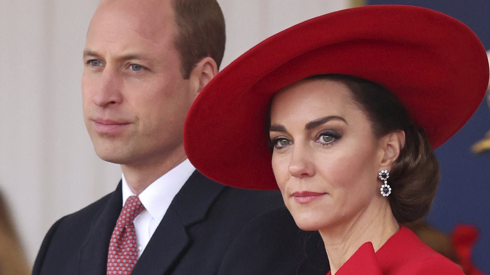 FILE - Britain's Prince William, left, and Britain's Kate, Princess of Wales, attend a ceremonial welcome for the President and the First Lady of the Republic of Korea at Horse Guards Parade in London, England on Nov. 21, 2023. Attention on Princess Kate has reached levels not seen since she married Prince William in a fairy-tale wedding in 2011. An admission from Kate that she altered an official family photo triggered a backlash. (Chris Jackson/Pool Photo via AP, File)