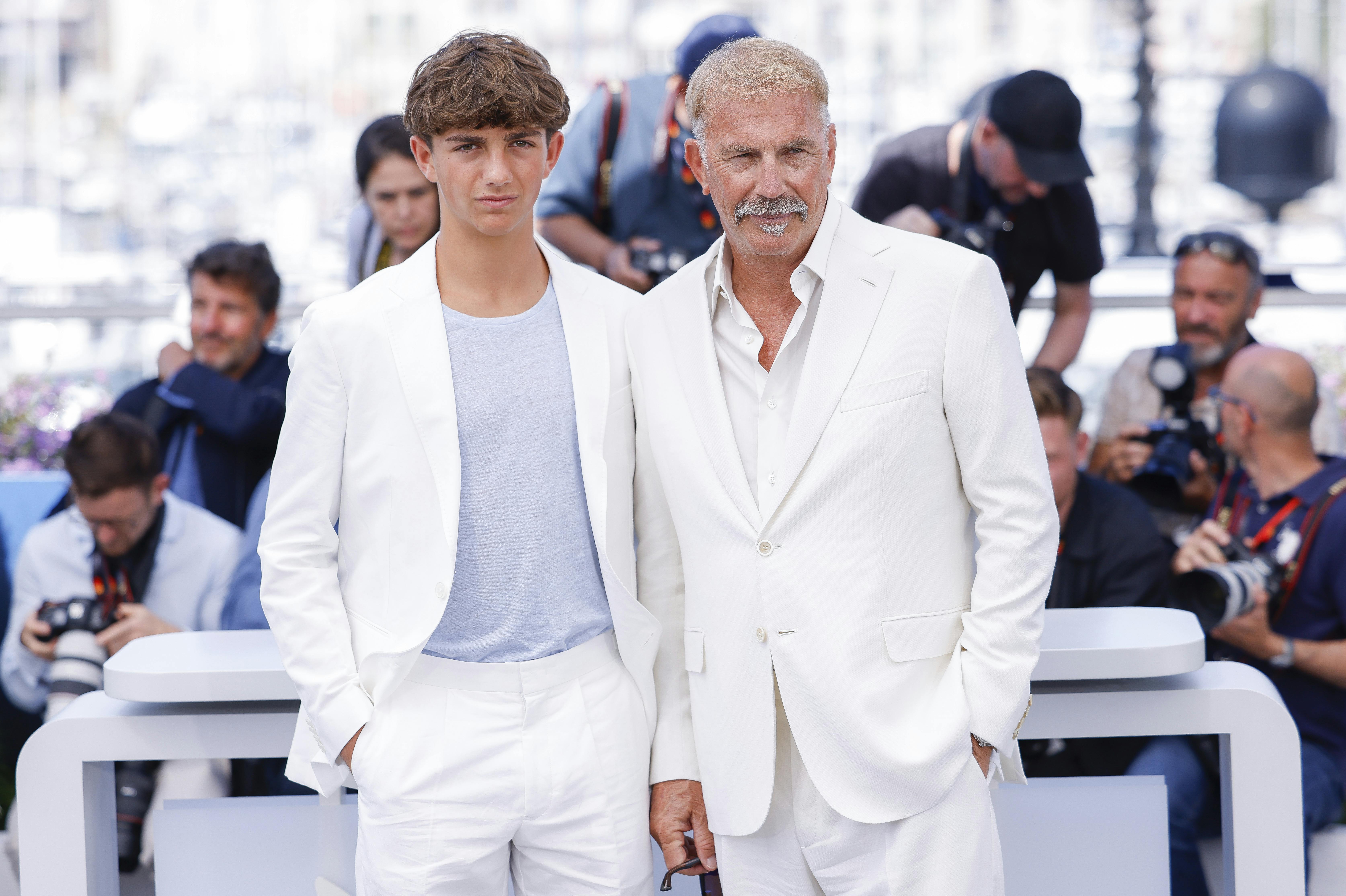 Kevin Costner, right, and Hayes Costner pose for photographers at the photo call for the film 'Horizon: An American Saga' at the 77th international film festival, Cannes, southern France, Sunday, May 19, 2024. (Photo by Vianney Le Caer/Invision/AP)