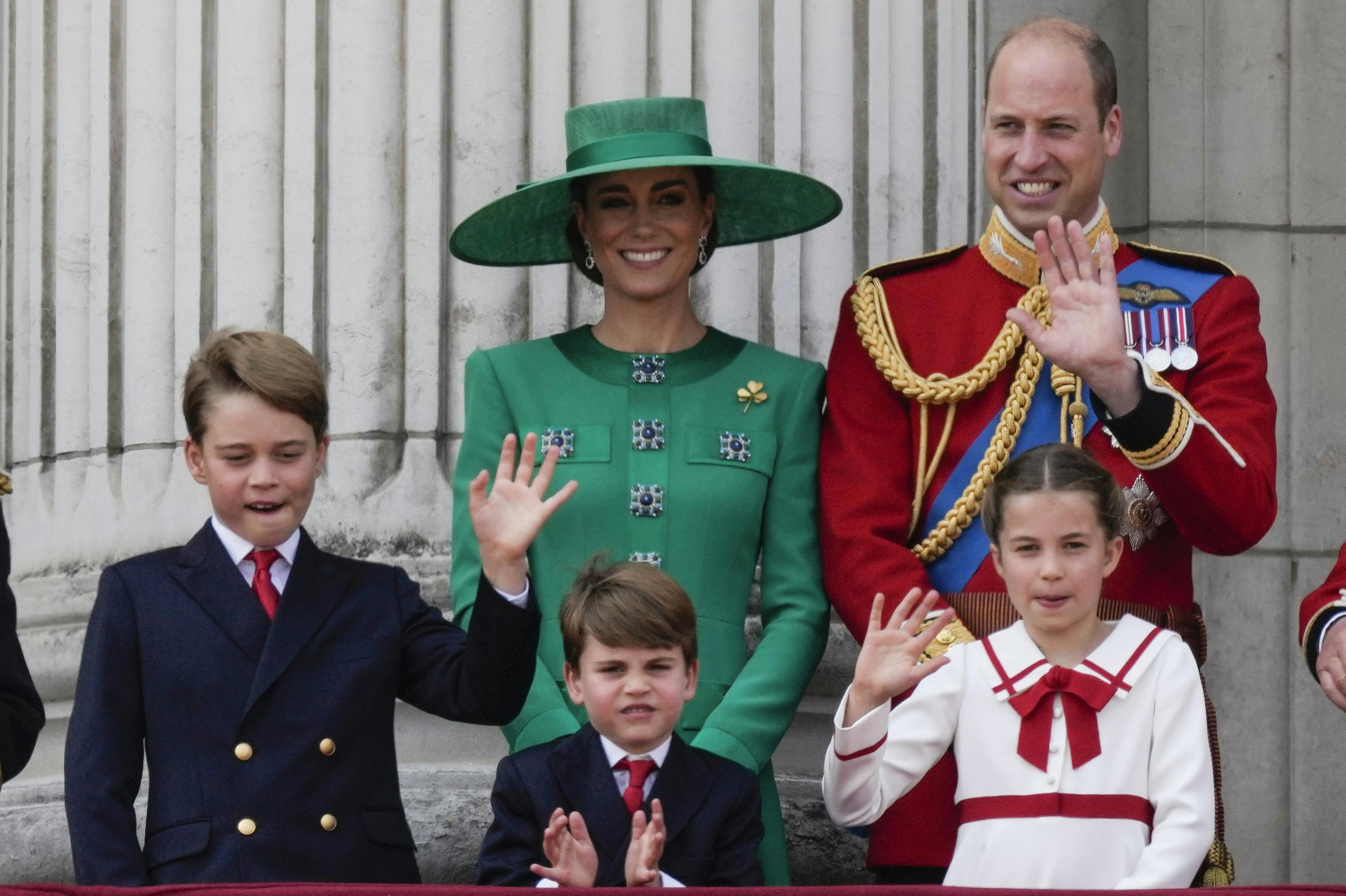 Prince William, right, Kate, Princess of Wales, centre, Princess Charlotte, bottom right, Prince George, left, and Prince Louis greet the crowd from the balcony of Buckingham Palace after the Trooping The Colour parade, in London, Saturday, June 17, 2023. Trooping the Colour is the King's Birthday Parade and one of the nation's most impressive and iconic annual events attended by almost every member of the Royal Family.(AP Photo/Alastair Grant)