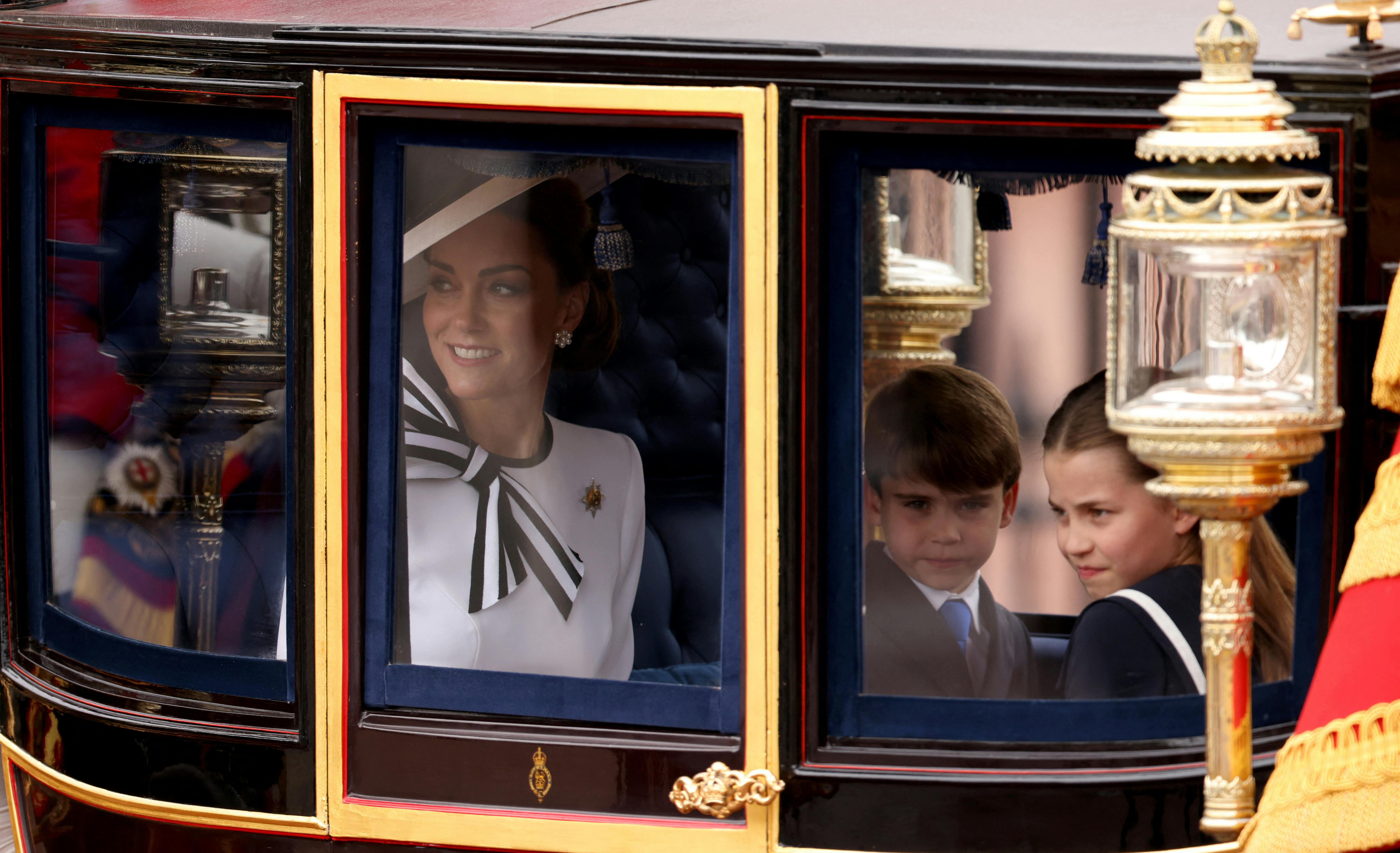 Britain's Catherine, Princess of Wales, Prince George, Princess Charlotte and Prince Louis attend the Trooping the Colour parade to honour Britain's King Charles on his official birthday in London, Britain, June 15, 2024. REUTERS/Hollie Adams