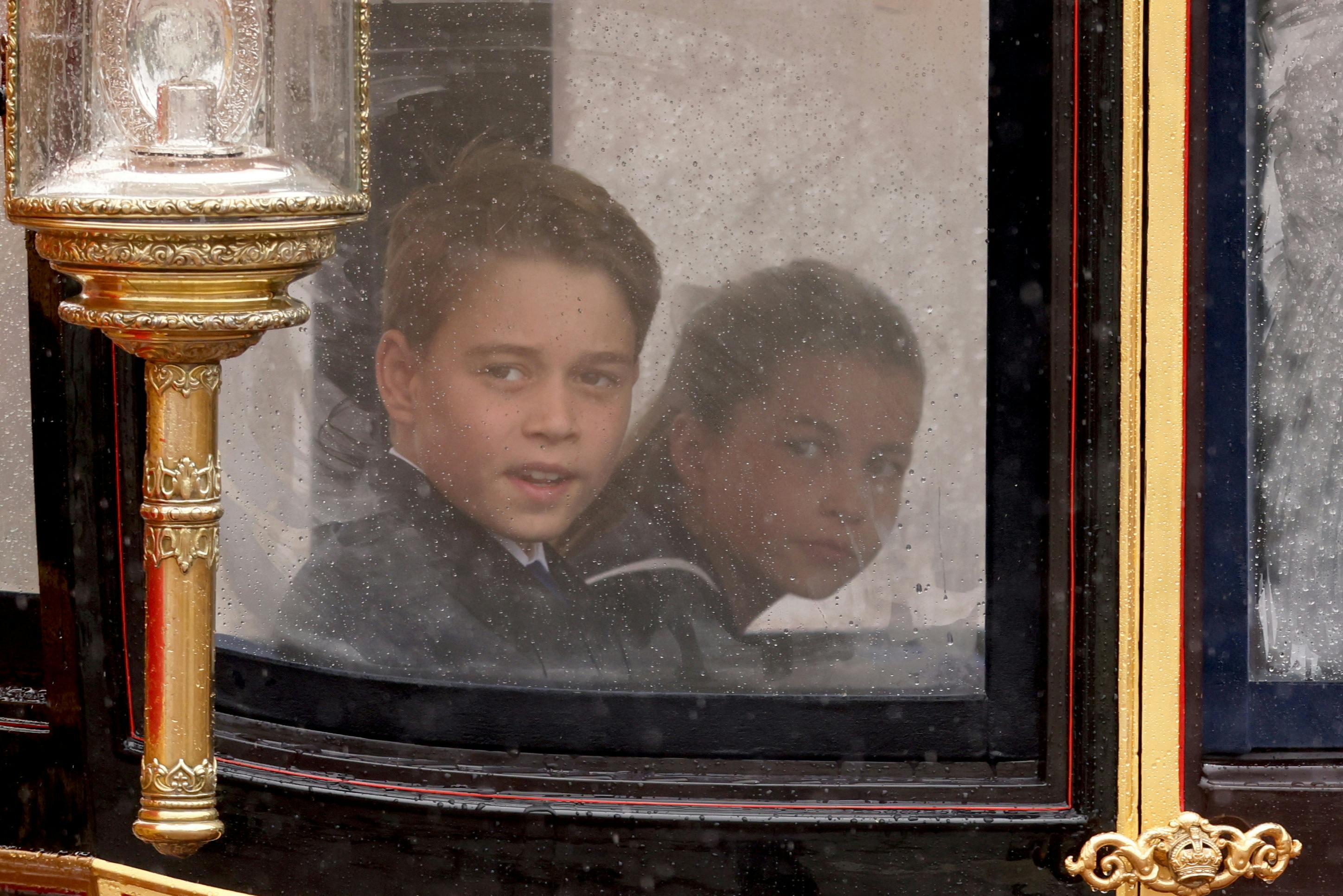 Britain's Princess Charlotte and Prince George attend the Trooping the Colour parade to honour Britain's King Charles on his official birthday in London, Britain, June 15, 2024. REUTERS/Hollie Adams