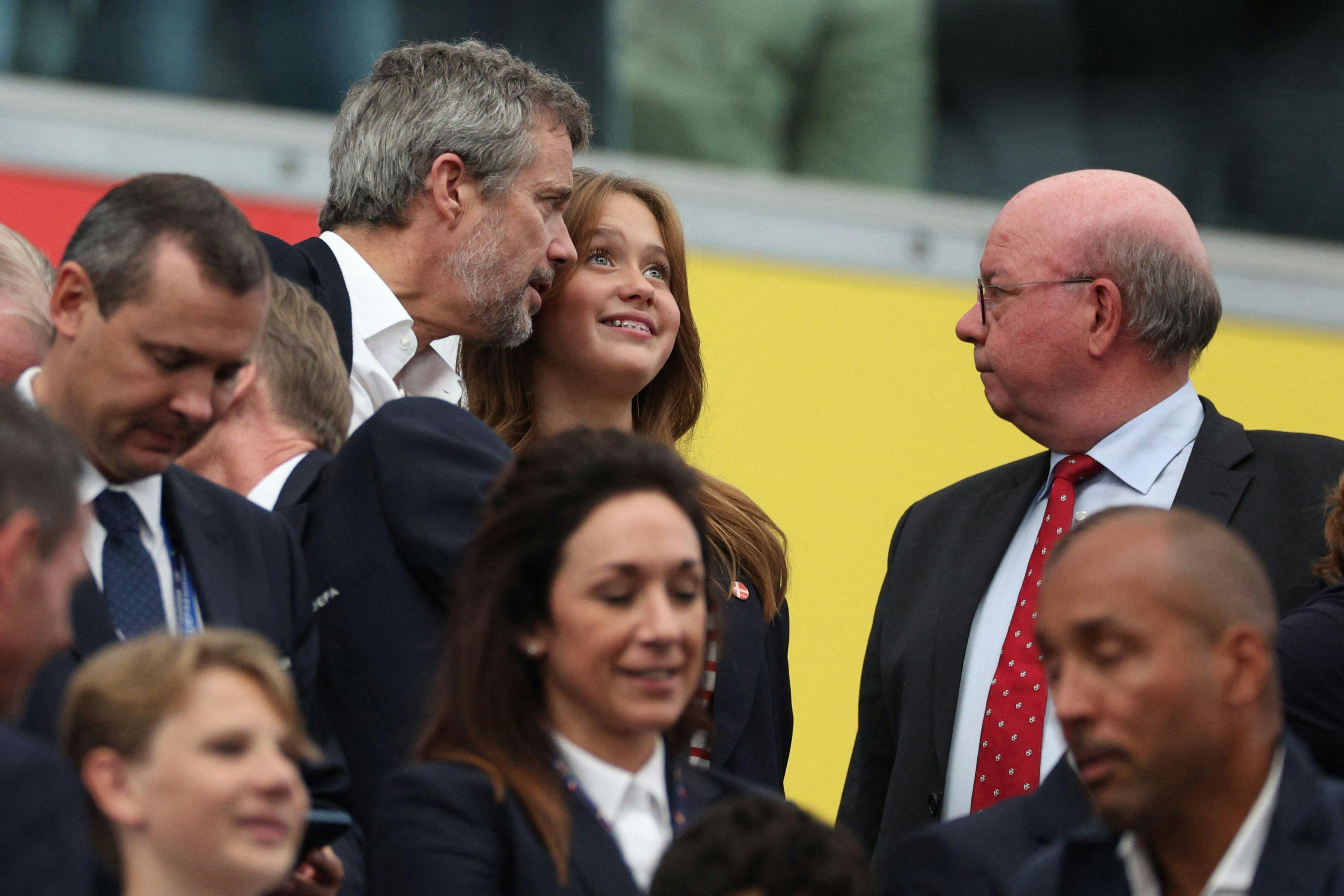 King of Denmark Frederik X and his daughter Princess Isabella attend the UEFA Euro 2024 Group C football match between Denmark and England at the Frankfurt Arena in Frankfurt am Main on June 20, 2024. (Photo by Adrian DENNIS / AFP)