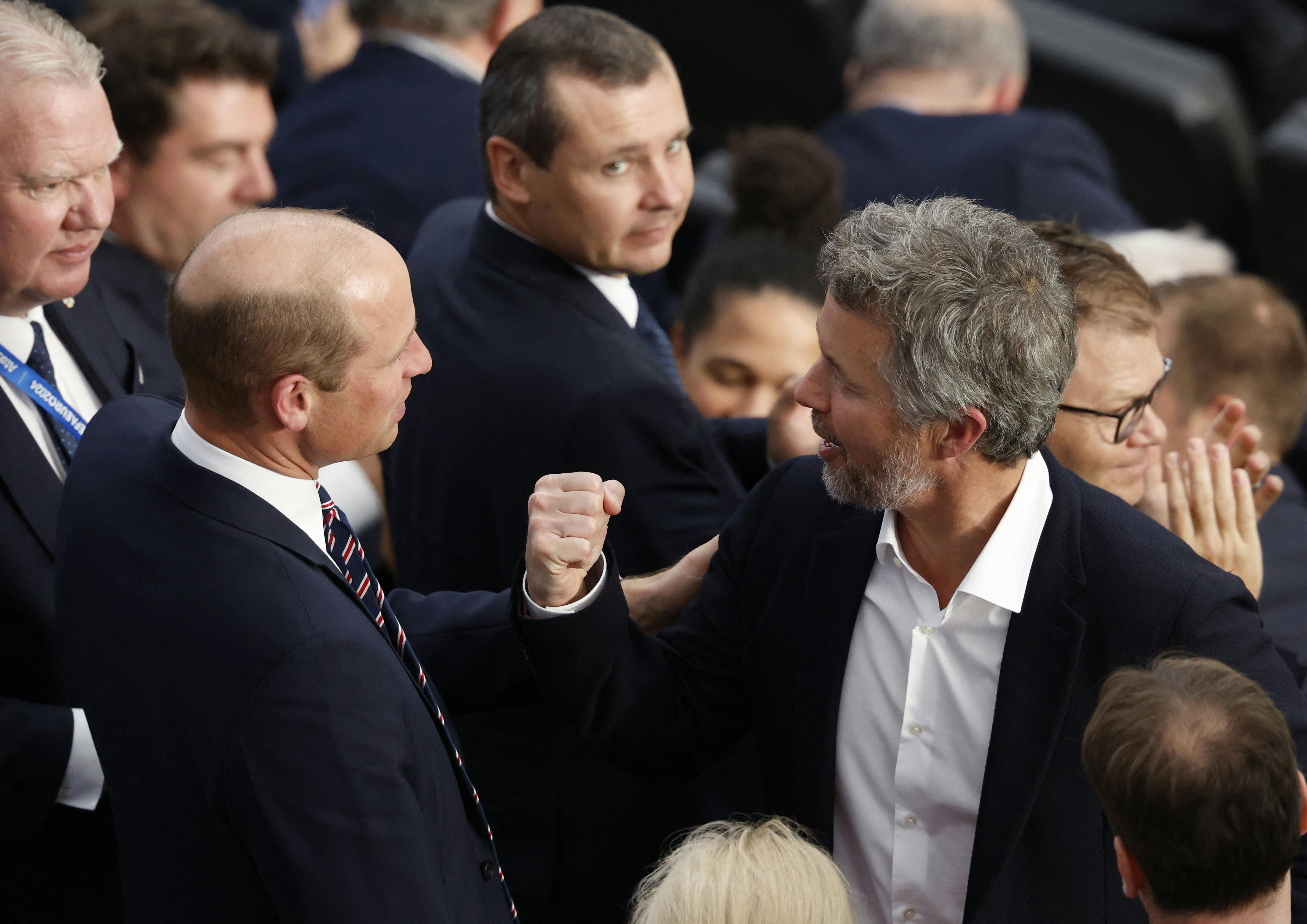 Soccer Football - Euro 2024 - Group C - Denmark v England - Frankfurt Arena, Frankfurt, Germany - June 20, 2024 Denmark's King Frederik gestures towards Britain's Prince William, Prince of Wales in the stand after the match REUTERS/Heiko Becker