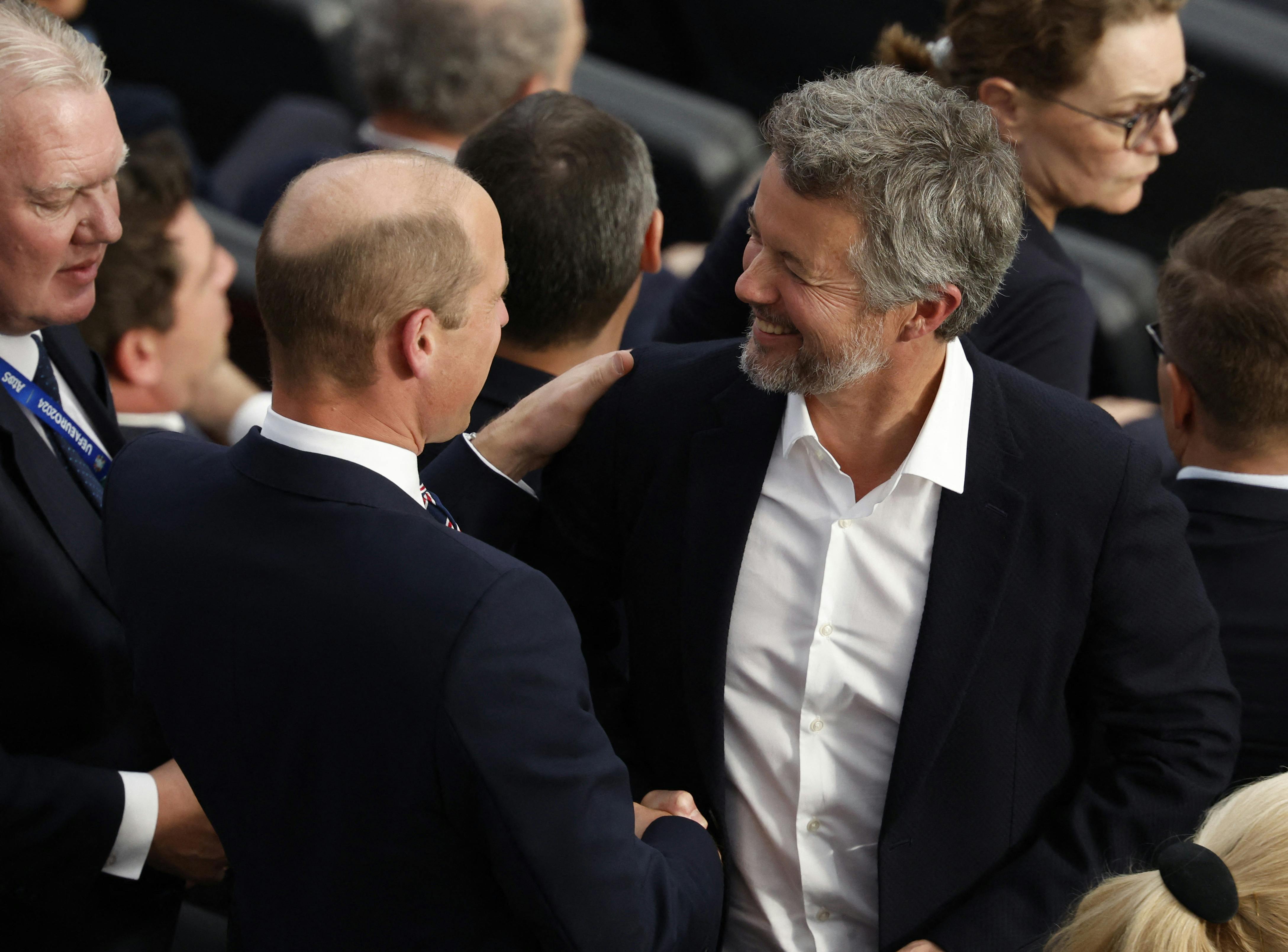 Soccer Football - Euro 2024 - Group C - Denmark v England - Frankfurt Arena, Frankfurt, Germany - June 20, 2024 Denmark's King Frederik and Britain's Prince William, Prince of Wales in the stand after the match REUTERS/Heiko Becker