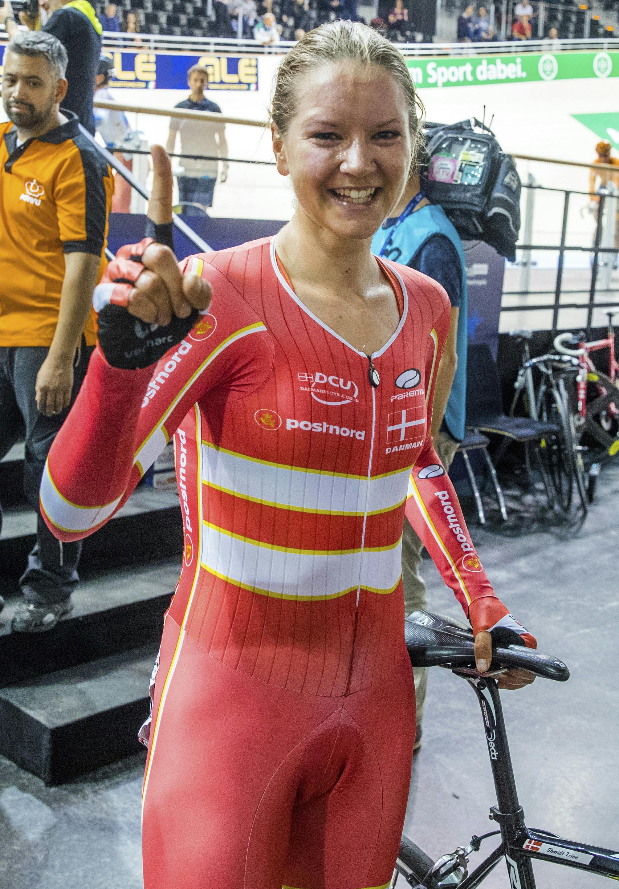 Trine Schmidt of Denmark celebrates after winning the women's 24 km point race at the Track European Championships 2017 in Berlin, Germany, Friday, Oct. 20, 2017. (Jens Buettner/dpa via AP)