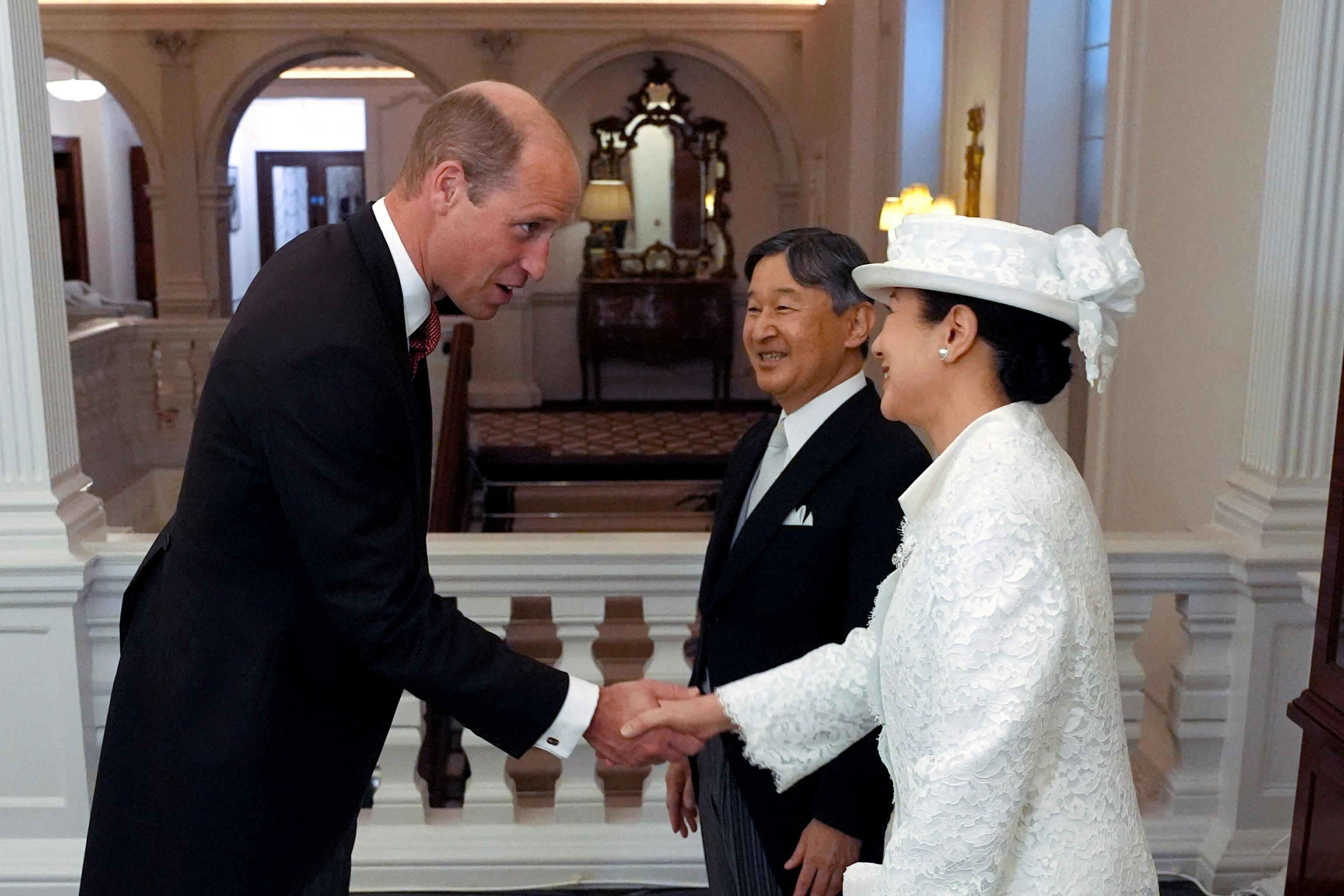 Britain's Prince William greets Empress Masako and Emperor Naruhito of Japan at their hotel in London, on behalf of the King, before the ceremonial welcome at Horse Guards Parade, London, for their state visit to Britain. Jordan Pettitt/Pool via REUTERS