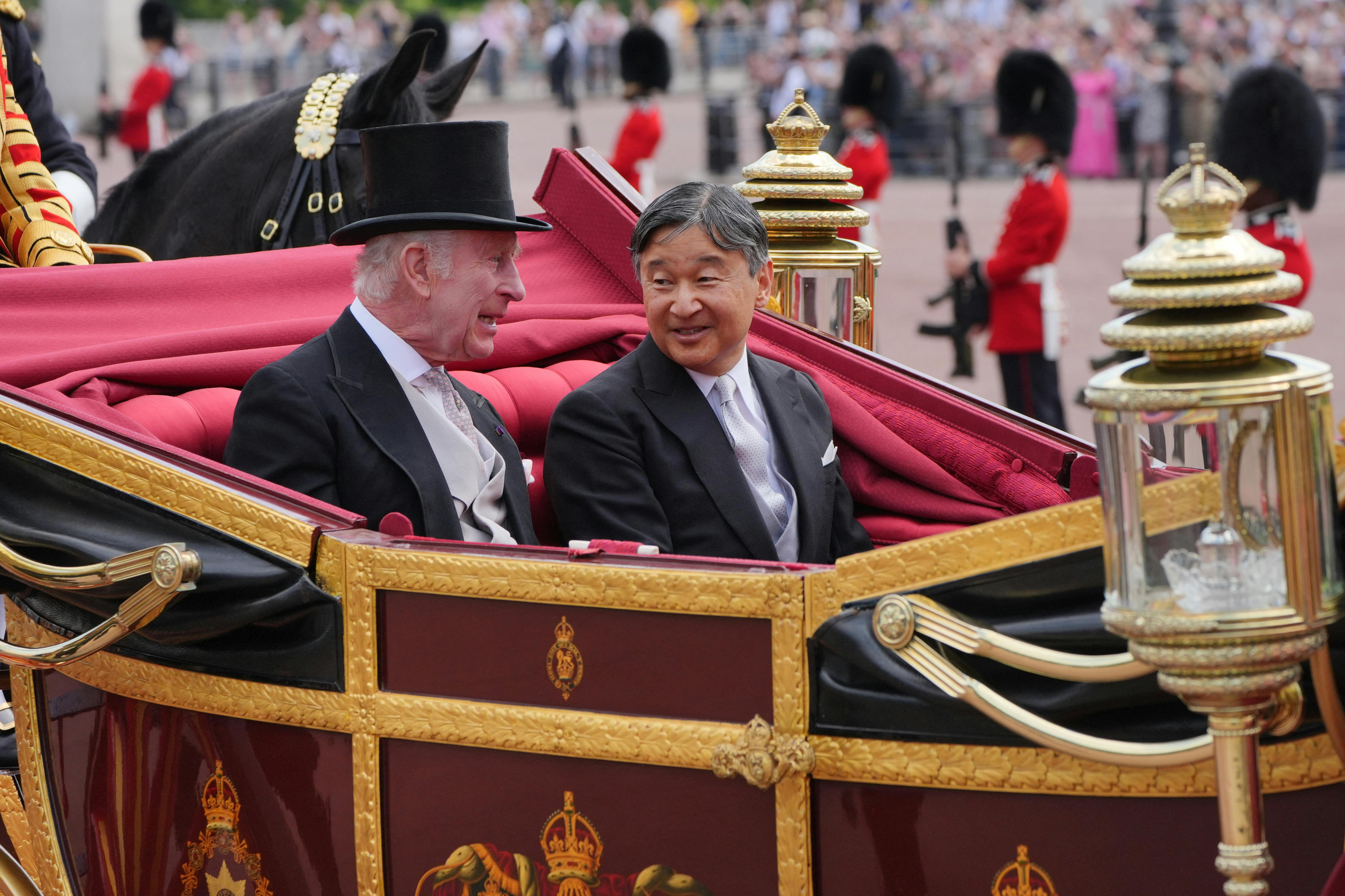 Britain's King Charles with Emperor Naruhito of Japan arrives at Buckingham Palace, London, during Emperor Naruhito's state visit to Britain. June 25, 2024. Jonathan Brady/Pool via REUTERS