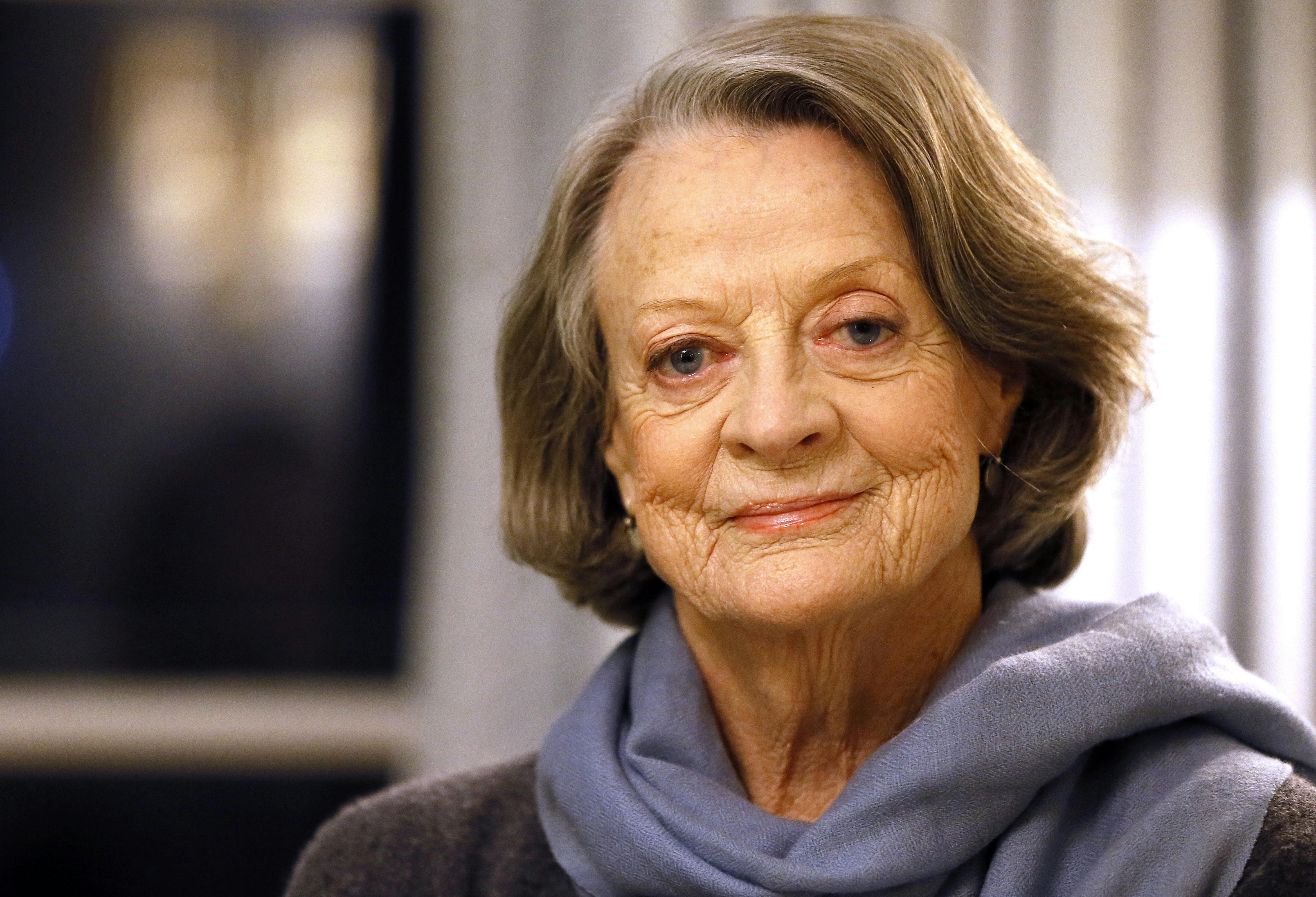 FILE - Dame Maggie Smith poses for a photo on Wednesday, Dec. 16, 2015 in London. Smith turns 87 on Dec. 28. (AP Photo/Kirsty Wigglesworth, File)