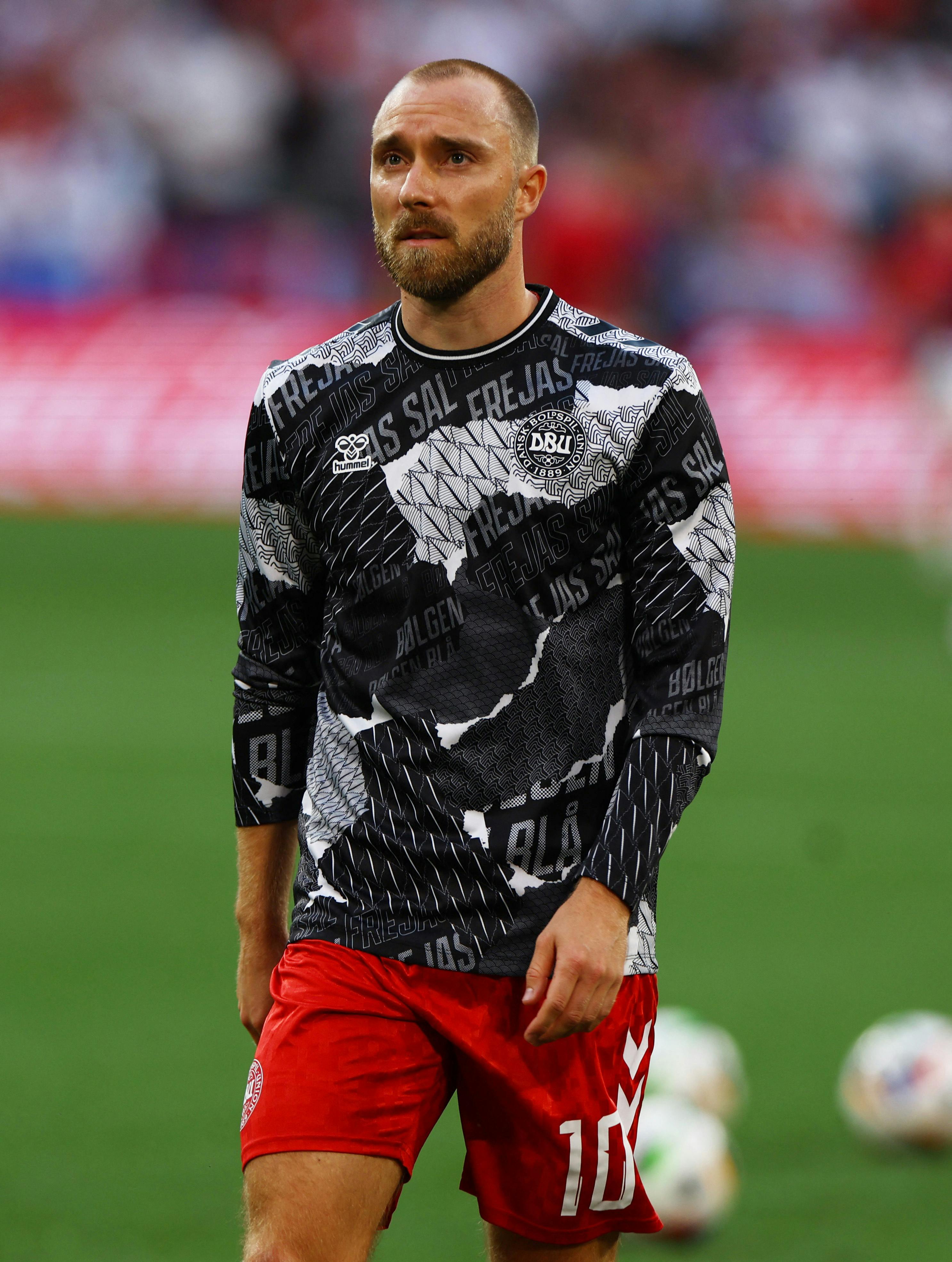 Soccer Football - Euro 2024 - Group D - Denmark v Serbia - Munich Football Arena, Munich, Germany - June 25, 2024 Denmark's Christian Eriksen during the warm up before the match REUTERS/Leonhard Simon