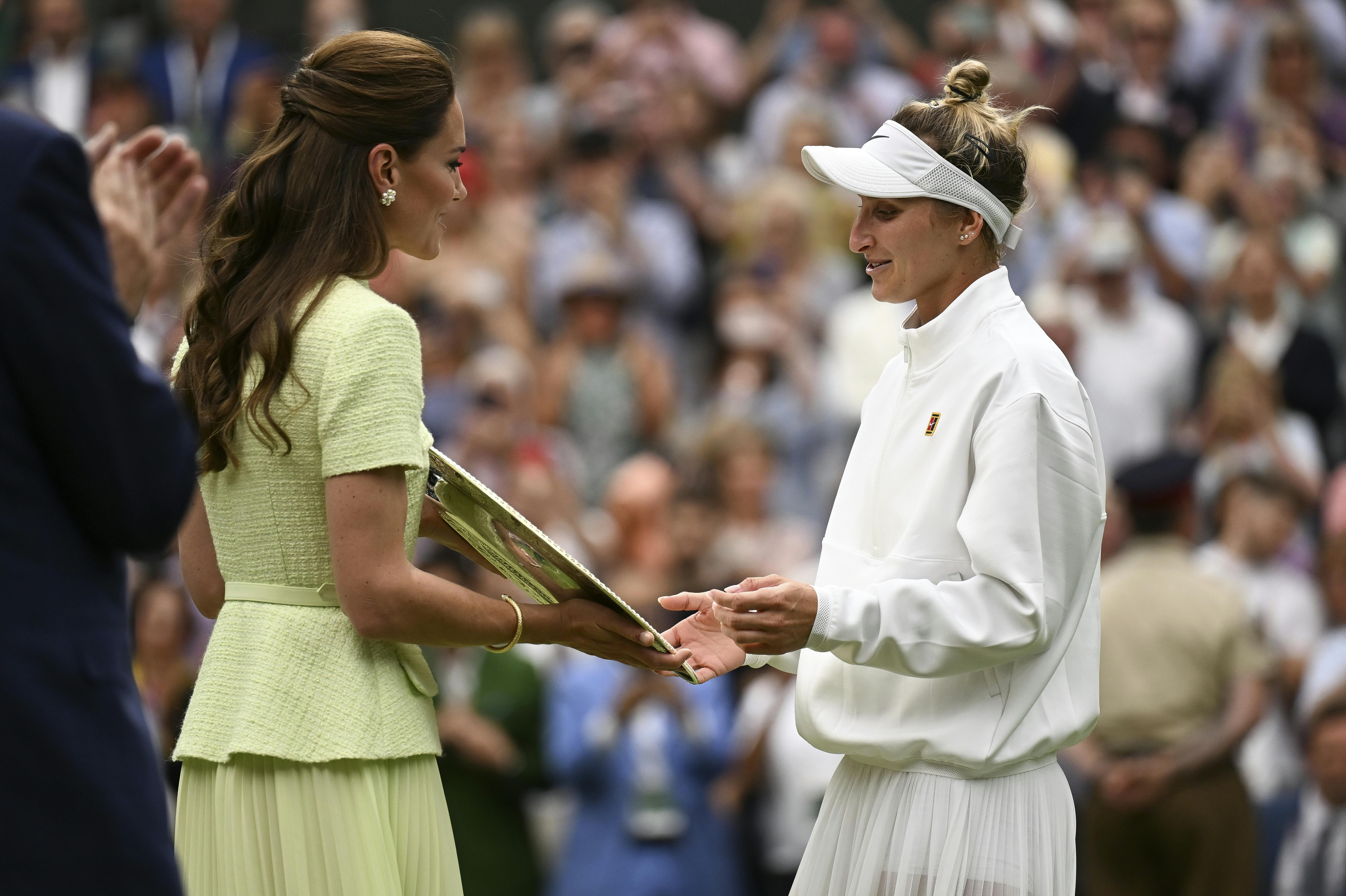 Czech Marketa Vondrousova wins Wimbledon and Her First Grand Slam Title in London, Great Britain, July 15, 2023. Vondrousova overpowered Ons Jabeur of Tunisia. Marketa Vondrousova receives her trophy from Britain's Kate (Catherine), Princess of Wales. Marketa Vondrousova becomes the first ever unseeded player to be crowned Wimbledon champion. Photo/Sidorjak Martin (CTK via AP Images)