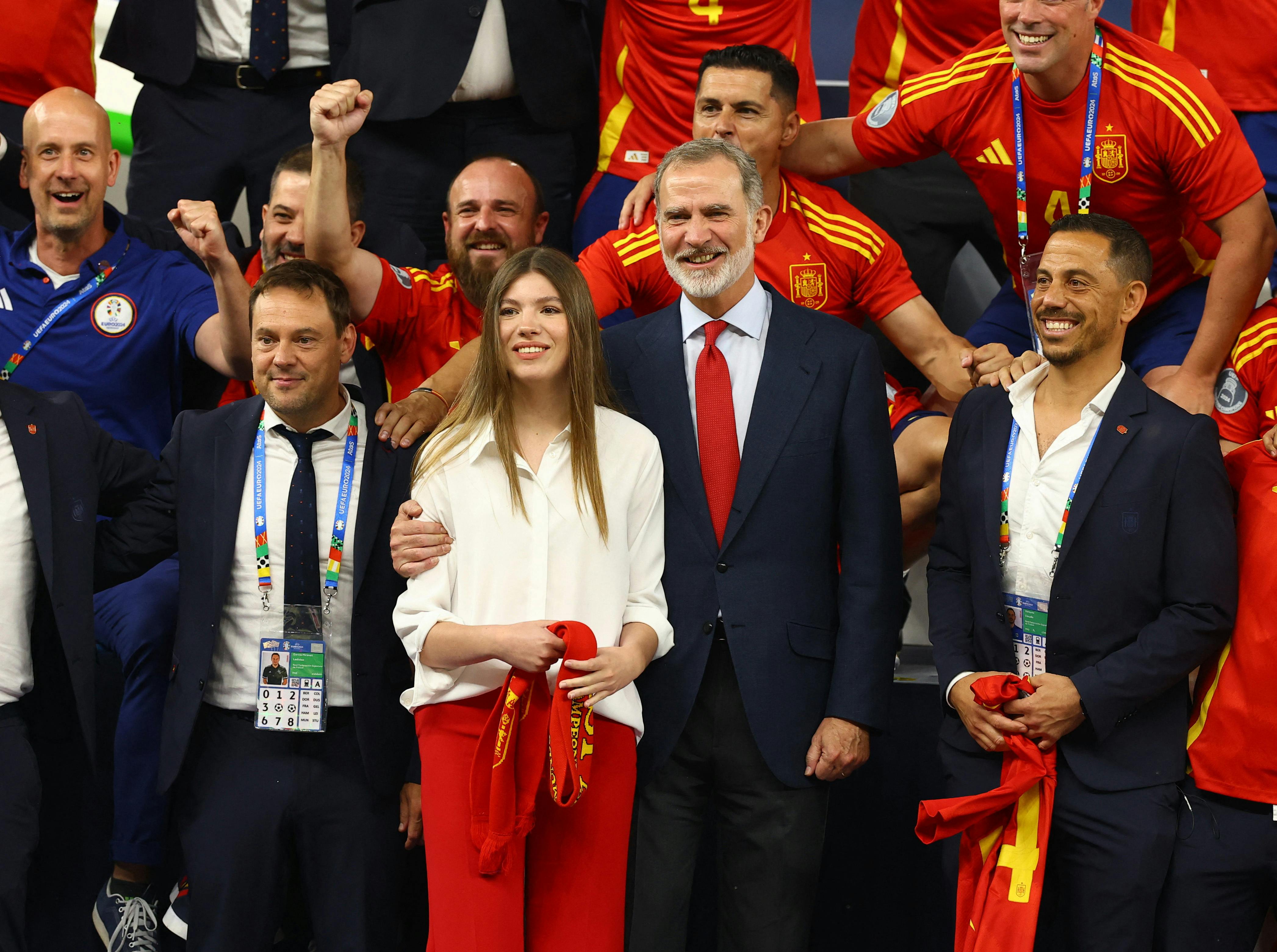 Soccer Football - Euro 2024 - Final - Spain v England - Berlin Olympiastadion, Berlin, Germany - July 14, 2024 King Felipe VI of Spain and his daughter Infanta Sofia celebrate with the team after victory REUTERS/Kai Pfaffenbach