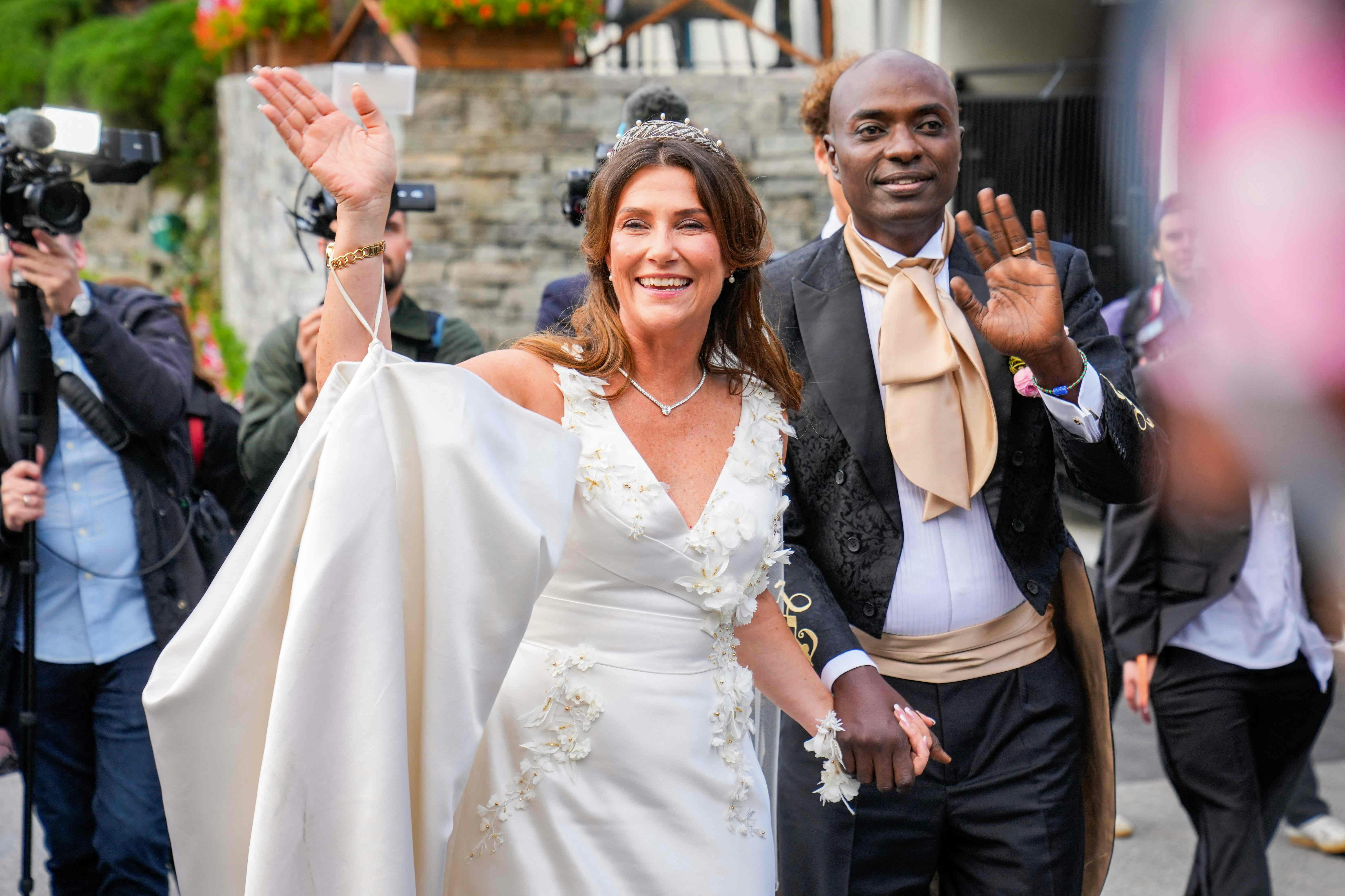 Princess Martha Louise of Norway and Durek Verrett arrive at their wedding party at Hotel Unio in Geiranger on August 31, 2024. Princess Martha Louise, the eldest child of King Harald will tie the knot on Saturday with American self-proclaimed shaman Durek Verrett. (Photo by Heiko Junge / NTB / AFP) / Norway OUT