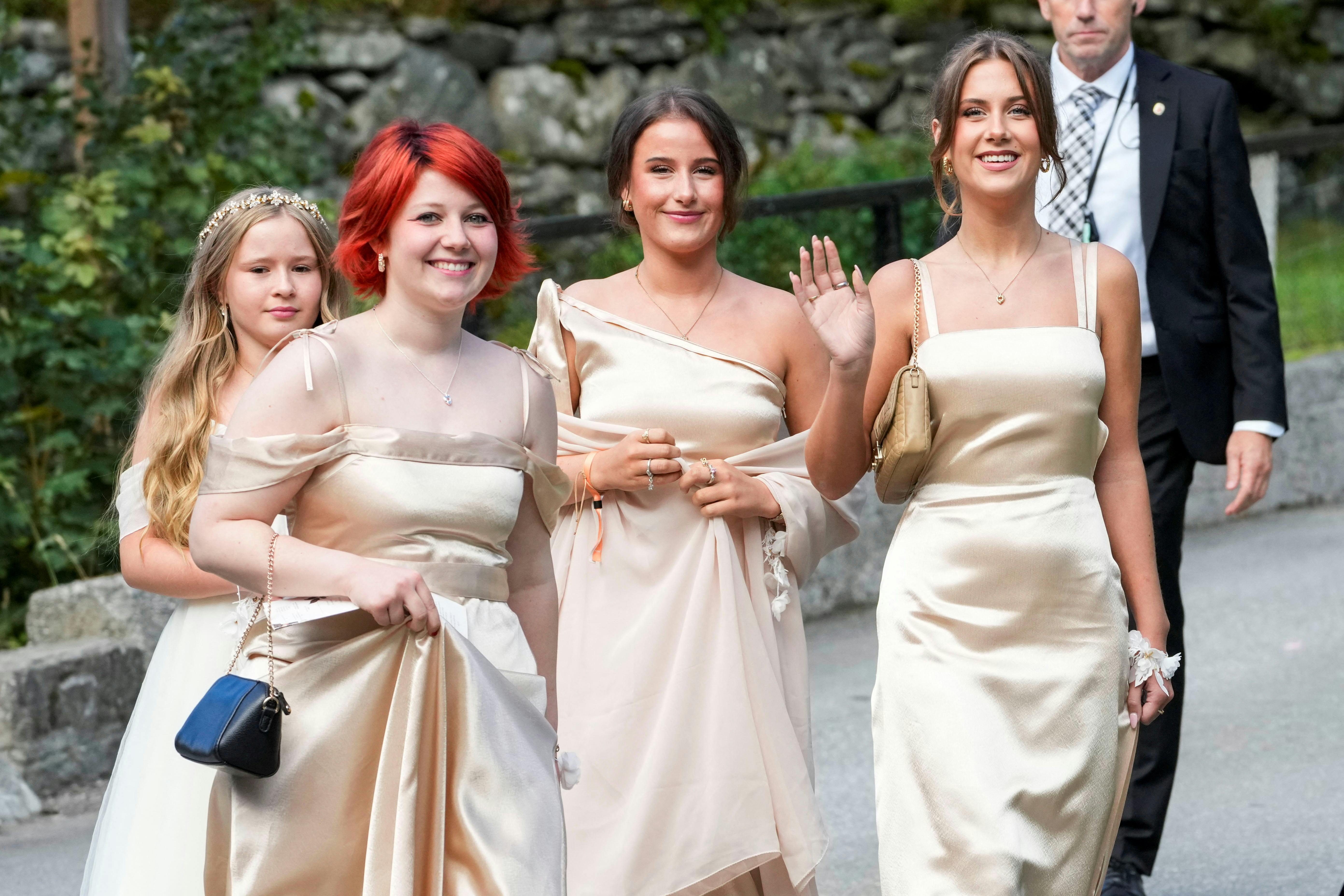 Maud Angelica Behn, Emma Tallulah Behn and Leah Isadora Behn, daughters of Norway's Princess Martha Louise, walk outside Hotel Union at Vinjevollen on the day of the wedding of Princess Martha Louise and Durek Verrett, in Geiranger, Norway, August 31, 2024. NTB/Cornelius Poppe via REUTERS ATTENTION EDITORS - THIS IMAGE WAS PROVIDED BY A THIRD PARTY. NORWAY OUT.NO COMMERCIAL OR EDITORIAL SALES IN NORWAY.