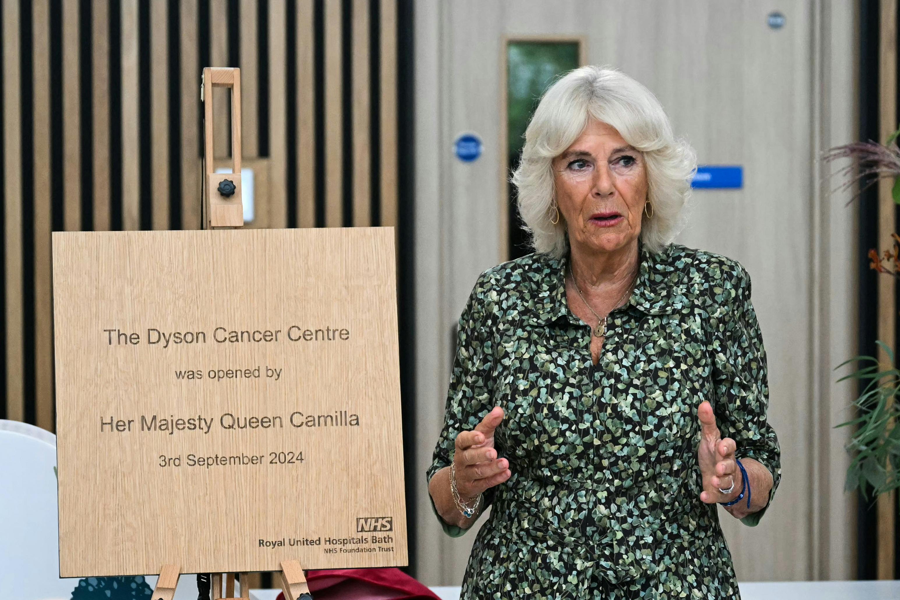 Britain's Queen Camilla delivers a speech after unveiling a plaque for the official opening of the Dyson Cancer Centre part of the Royal United Hospitals Bath NHS Foundation Trust, in Bath, Britain September 3, 2024. JUSTIN TALLIS/Pool via REUTERS