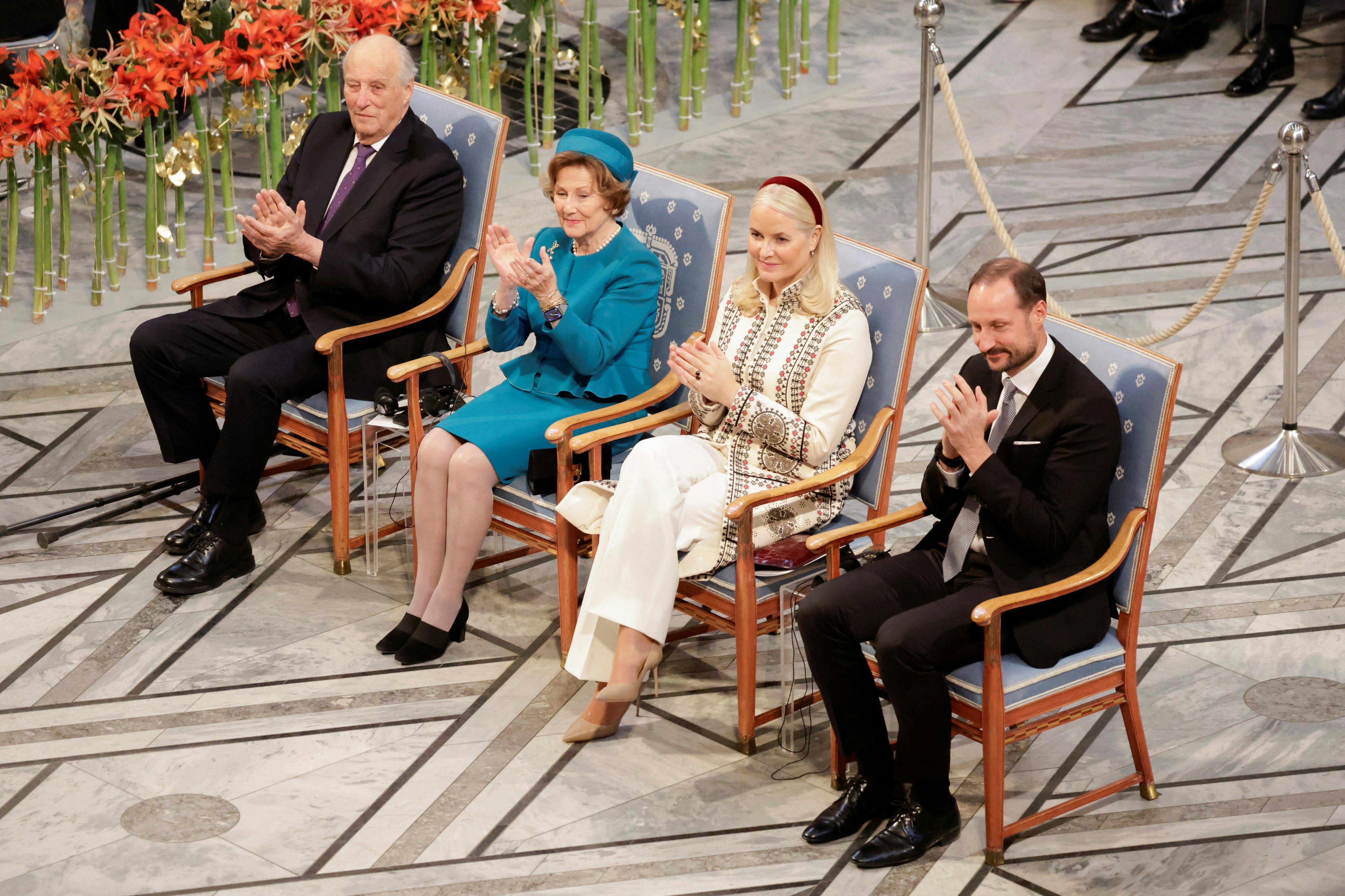 Norway's King Harald, Queen Sonja, Crown Prince Haakon and Crown Princess Mette-Marit applaud during the Nobel Peace Prize 2024 awarding ceremony at Oslo City Hall in Oslo, Norway December 10, 2024. REUTERS/Leonhard Foeger