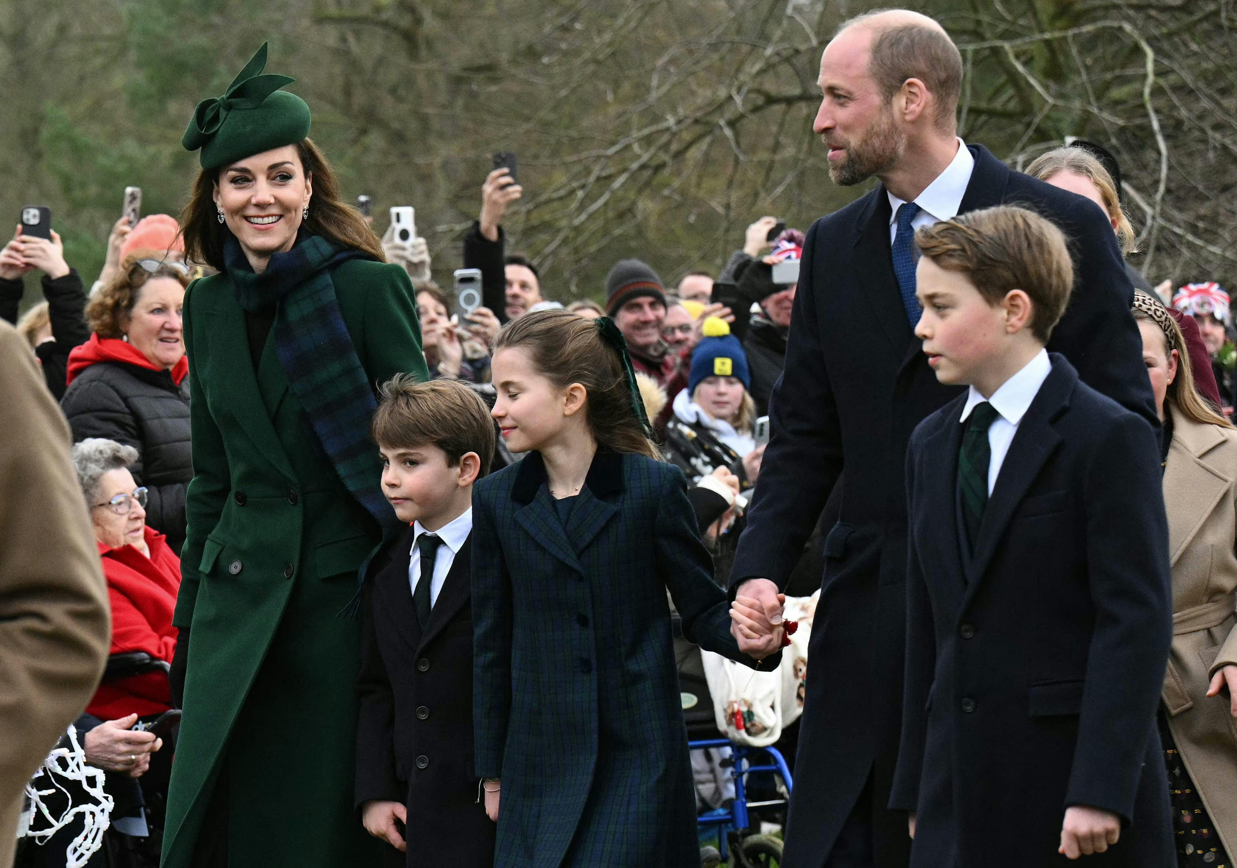 Britain's Catherine, Princess of Wales, Britain's Prince Louis of Wales, Britain's Princess Charlotte of Wales, Britain's Prince William, Prince of Wales and Britain's Prince George of Wales react upon arrival to attend the Royal Family's traditional Christmas Day service at St Mary Magdalene Church in Sandringham, Norfolk, eastern England, on December 25, 2024. (Photo by Oli SCARFF / AFP)