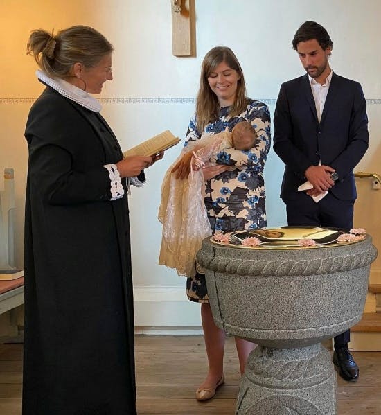 Lotte Friis og Christoffer Schnack Ringø ved datteren Andreas barnedåb.