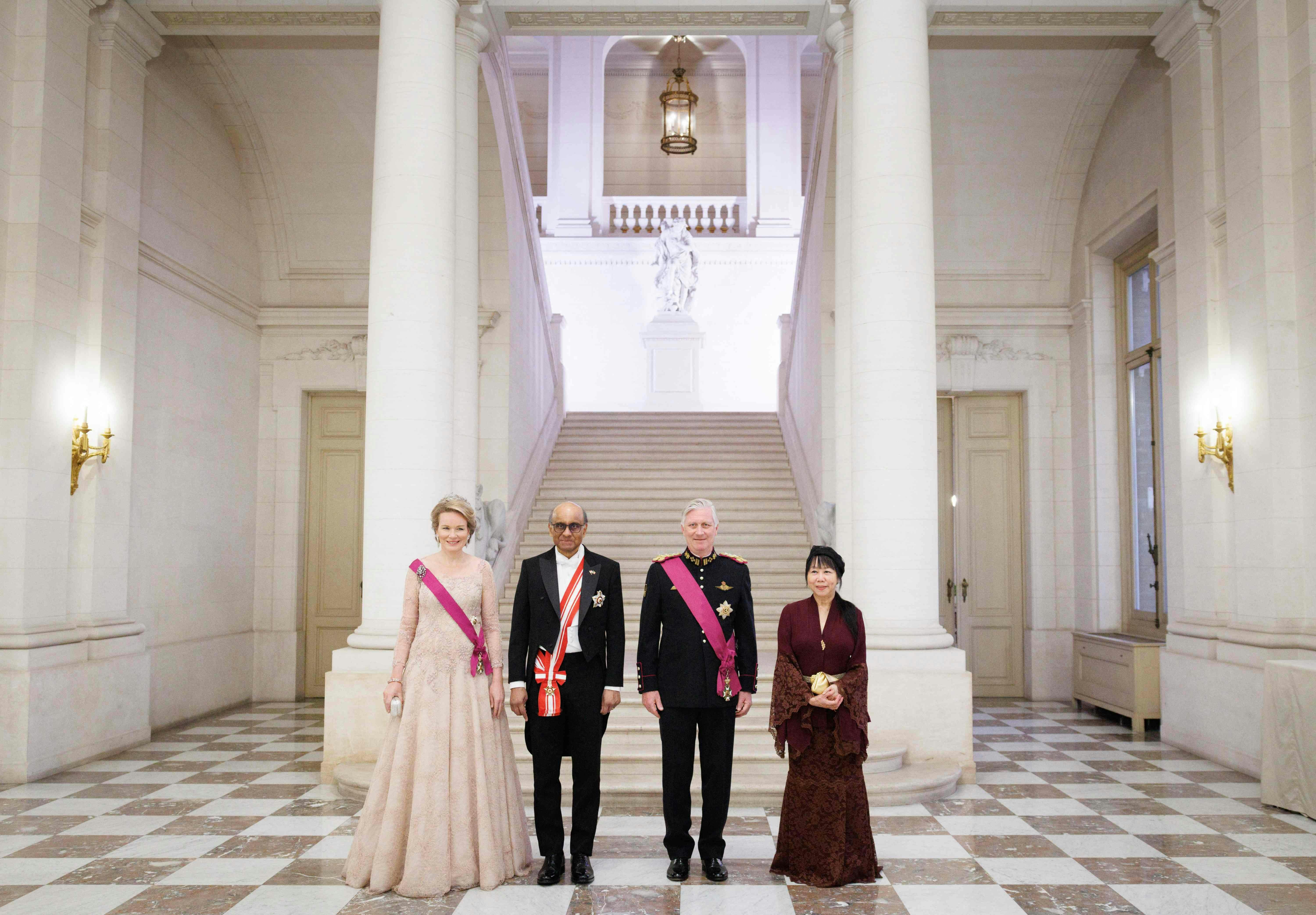 (L-R) Queen Mathilde of Belgium, Singapore President Tharman Shanmugaratnam, King Philippe of Belgium and Singapore First Lady Jane Yumiko Ittogi pose during the State Banquet at the Royal Castle in Laken, Brussels, part of an official state visit of the President of the Republic of Singapore to Belgium, on March 24, 2025. The Singapore President is on a three-day visit to Belgium. (Photo by BENOIT DOPPAGNE / Belga / AFP) / Belgium OUT