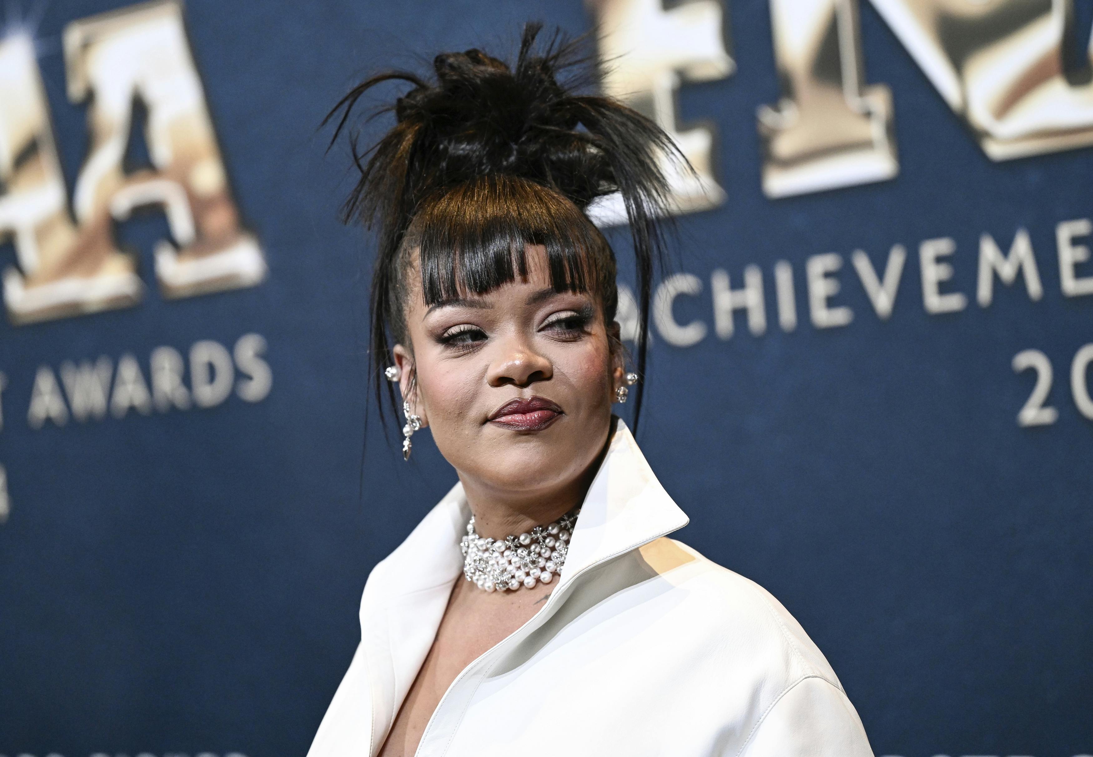 Rihanna attends the 38th annual Footwear News Achievement Awards at Cipriani South Street on Wednesday, Dec. 4, 2024, in New York. (Photo by Evan Agostini/Invision/AP)