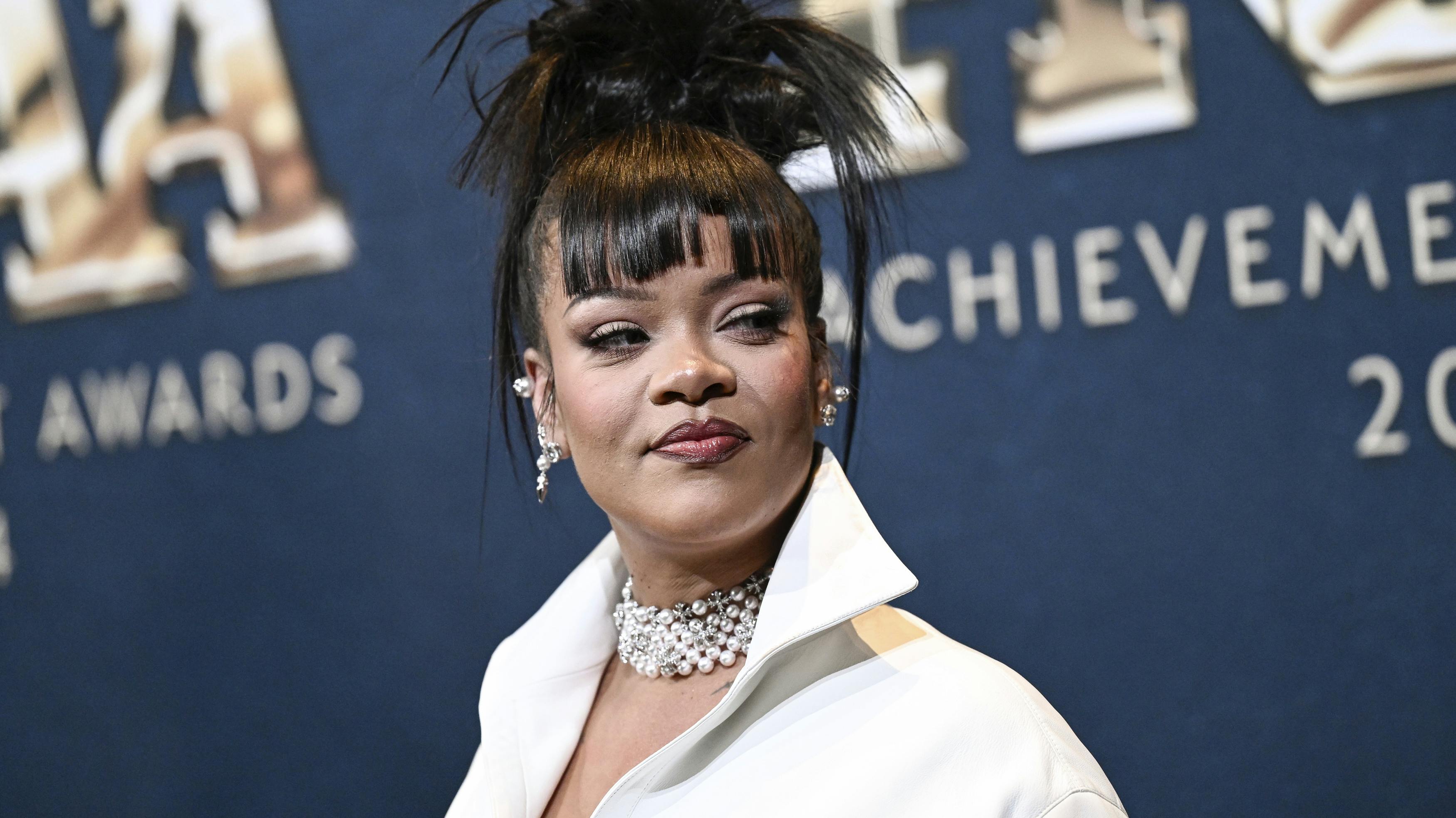 Rihanna attends the 38th annual Footwear News Achievement Awards at Cipriani South Street on Wednesday, Dec. 4, 2024, in New York. (Photo by Evan Agostini/Invision/AP)