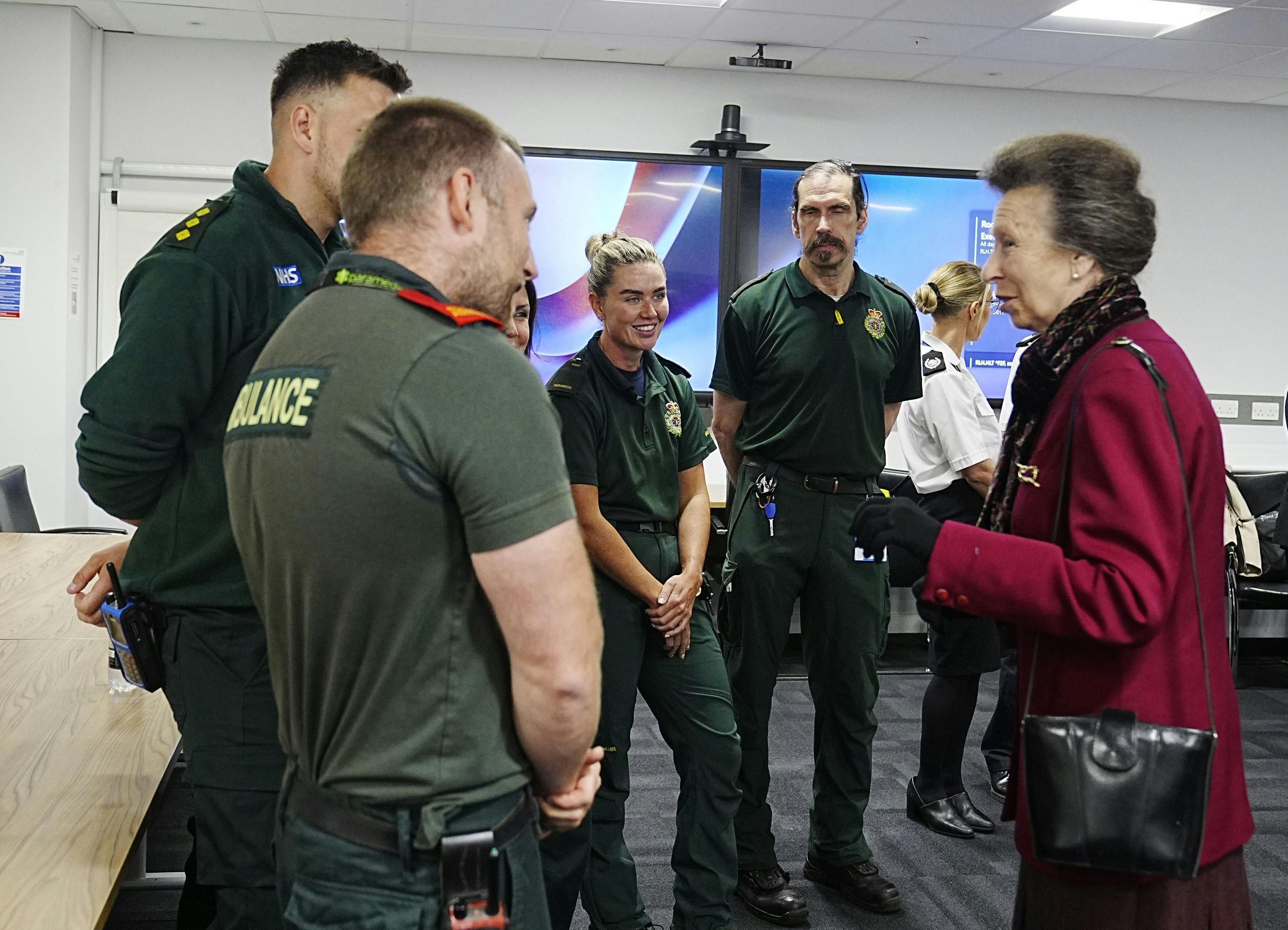 Britain's Princess Anne meets with members of the North West Ambulance Service (NWAS) team during a visit to the Royal Liverpool University Hospital to meet and thank emergency responders following an incident on Monday evening when a car ploughed into a crowd of people during Liverpool FC's Premier League victory parade, in Liverpool, England, Tuesday May 27, 2025. (Peter Byrne/PA, Pool via AP)