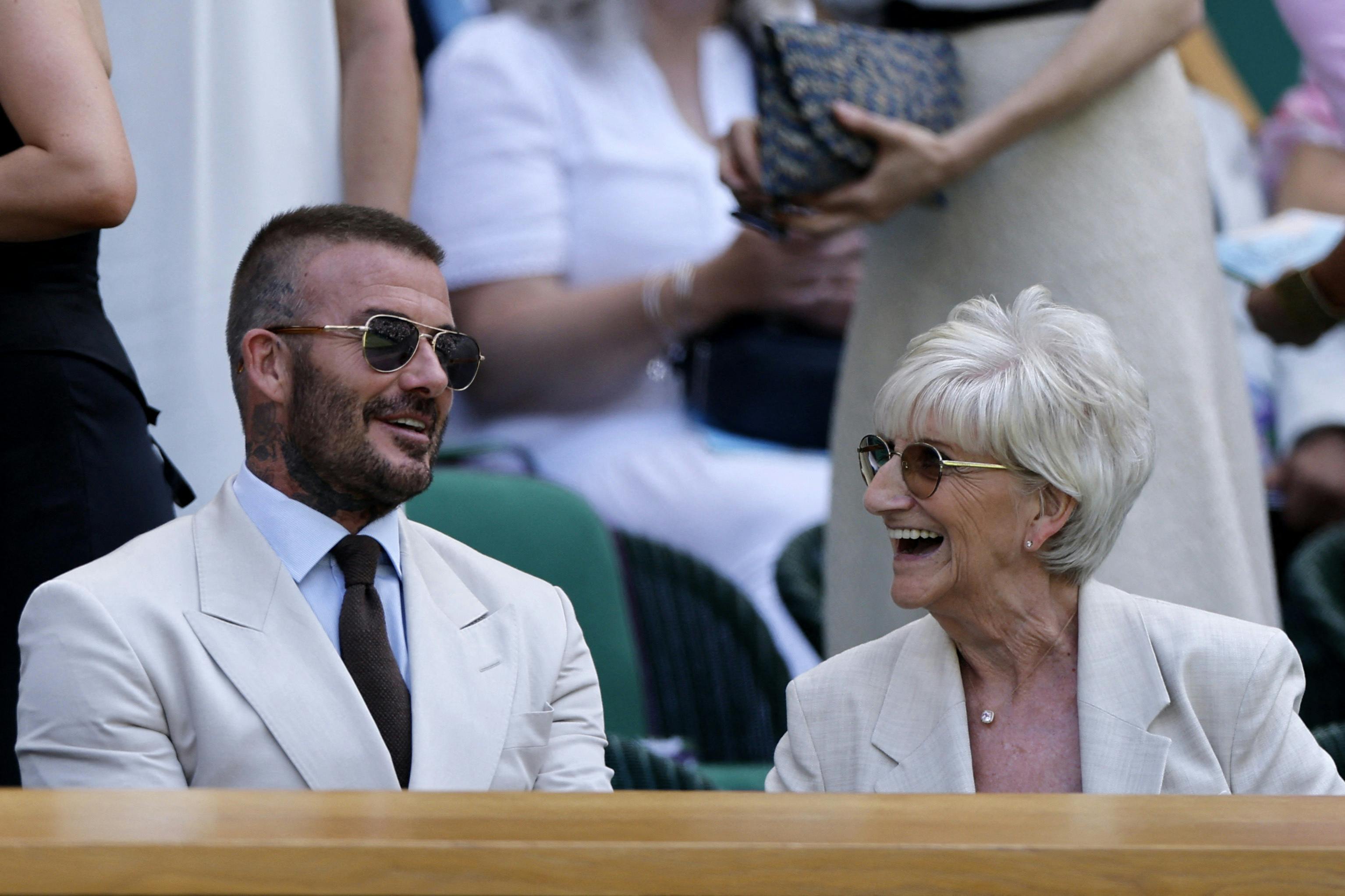 Tennis - Wimbledon - All England Lawn Tennis and Croquet Club, London, Britain - June 30, 2025 Former England footballer and Inter Miami CF co-owner David Beckham with his mother Sandra Beckham in the Royal Box during the first round match between Spain's Carlos Alcaraz and Italy's Fabio Fognini REUTERS/Stephanie Lecocq