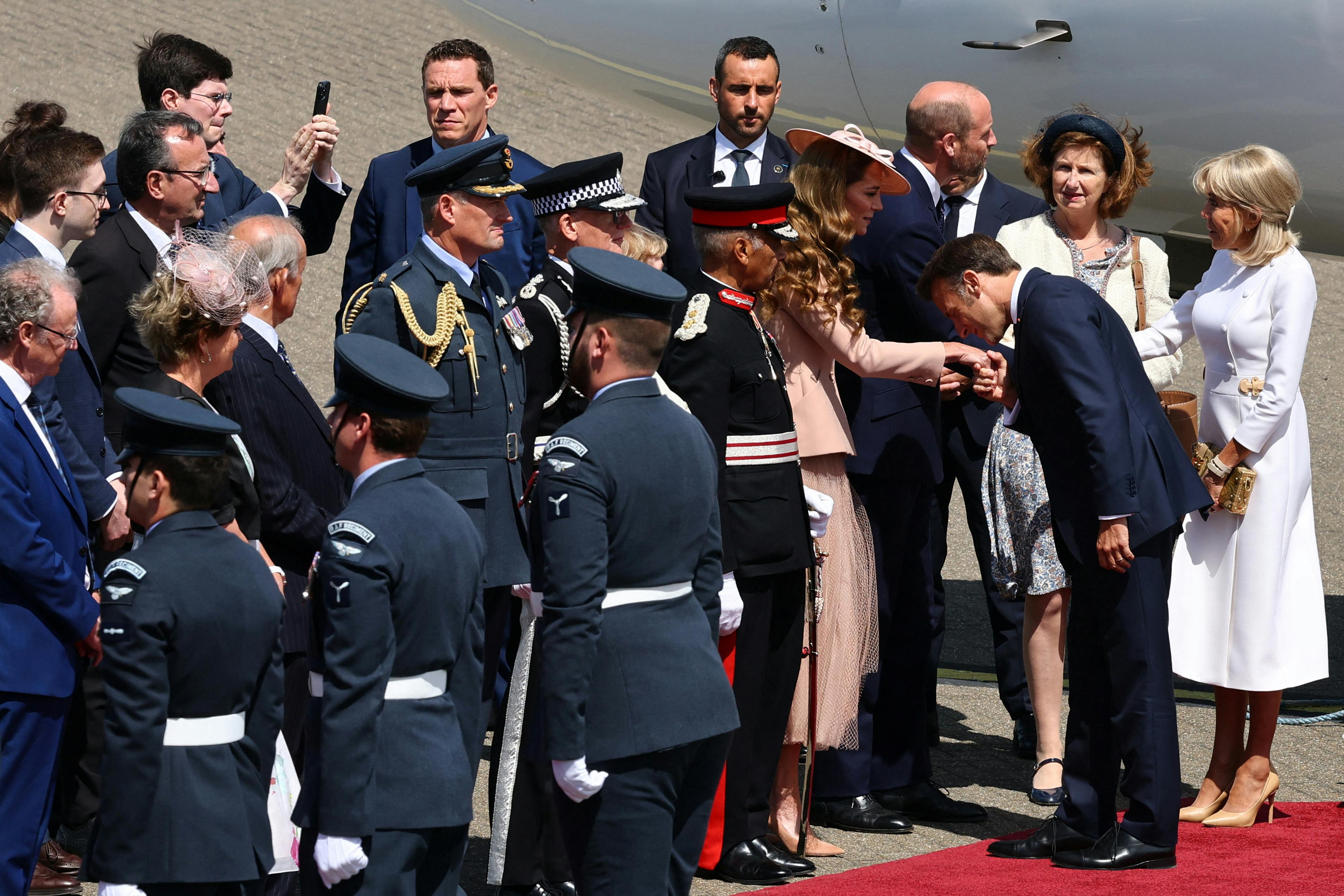 Prince William, Prince of Wales and Catherine, Princess of Wales welcome France's President Emmanuel Macron and his wife Brigitte Macron at RAF Northolt in London, as they arrive for a three-day state visit to the United Kingdom, Britain, July 8, 2025. REUTERS/Gonzalo Fuentes/Pool TPX IMAGES OF THE DAY