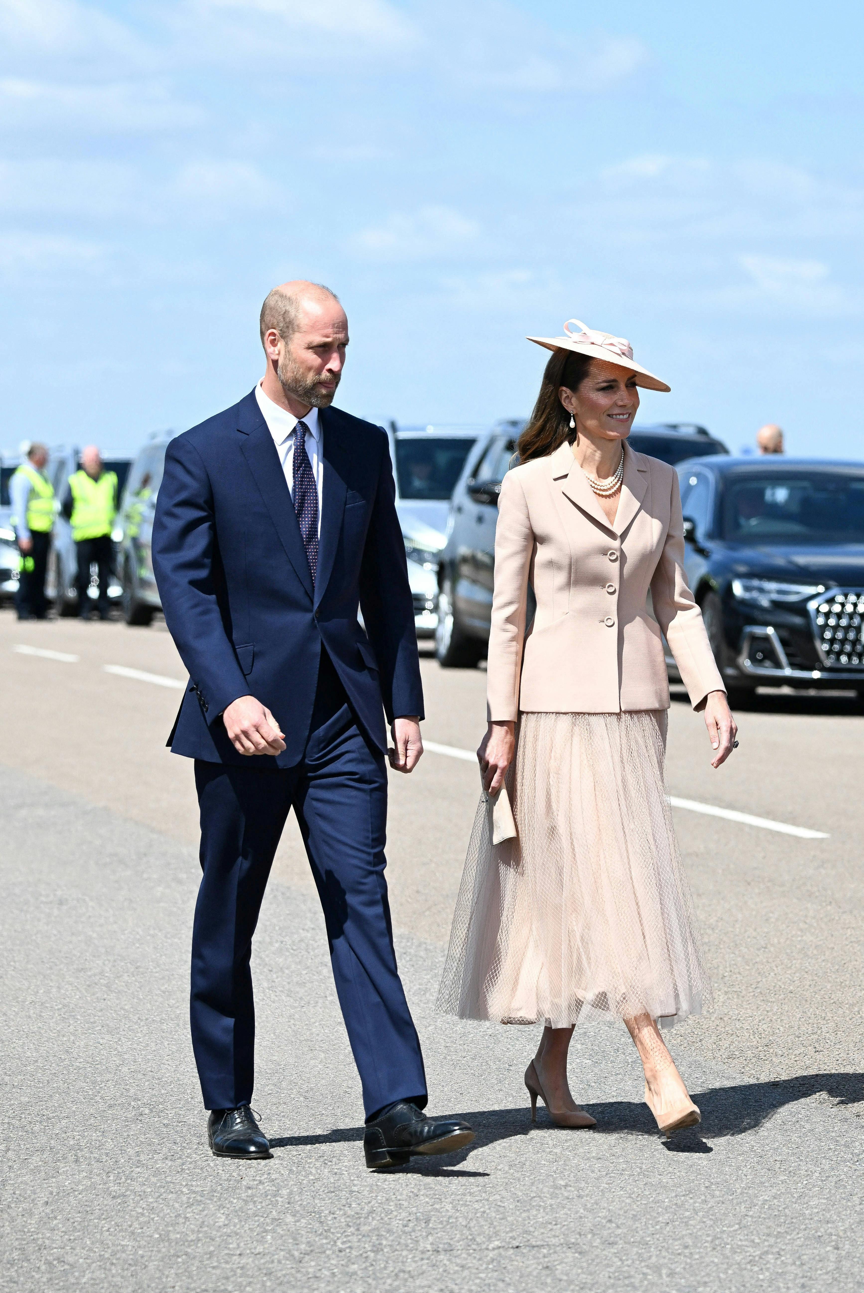 Britain's Prince William, Prince of Wales and Britain's Catherine, Princess of Wales walk on the day they welcome France's President Emmanuel Macron and Brigitte Macron at RAF Northolt, Britain on July 8, 2025. JEANNE ACCORSINI/Pool via REUTERS