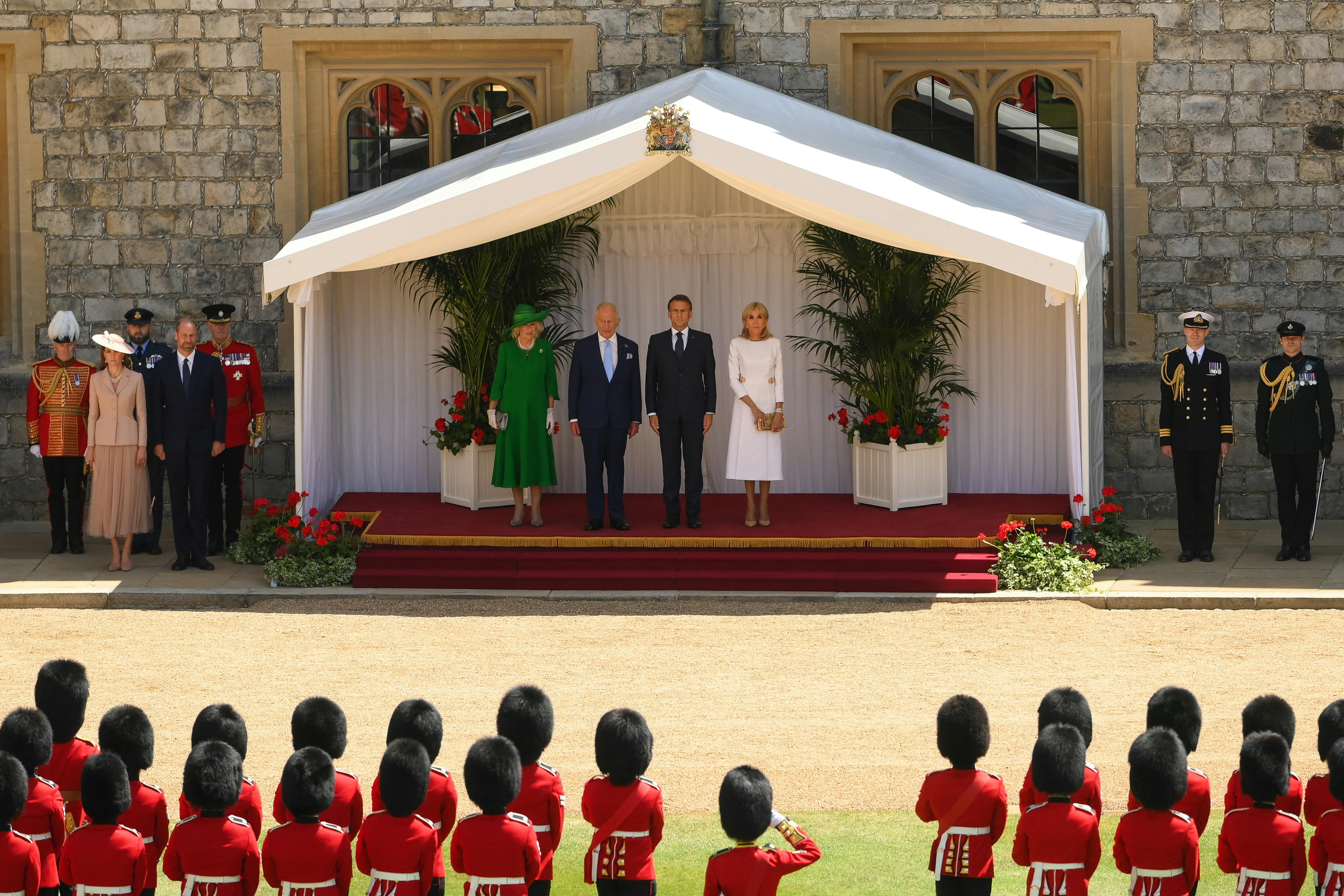 Britain's Catherine, Princess of Wales, Britain's William, Prince of Wales, Britain's Queen Camilla, Britain's King Charles, French President Emmanuel Macron and his wife Brigitte Macron stand at Windsor Castle as part of a state visit of French President Macron to the United Kingdom, in Windsor, Britain, July 8, 2025. REUTERS/Jaimi Joy/Pool