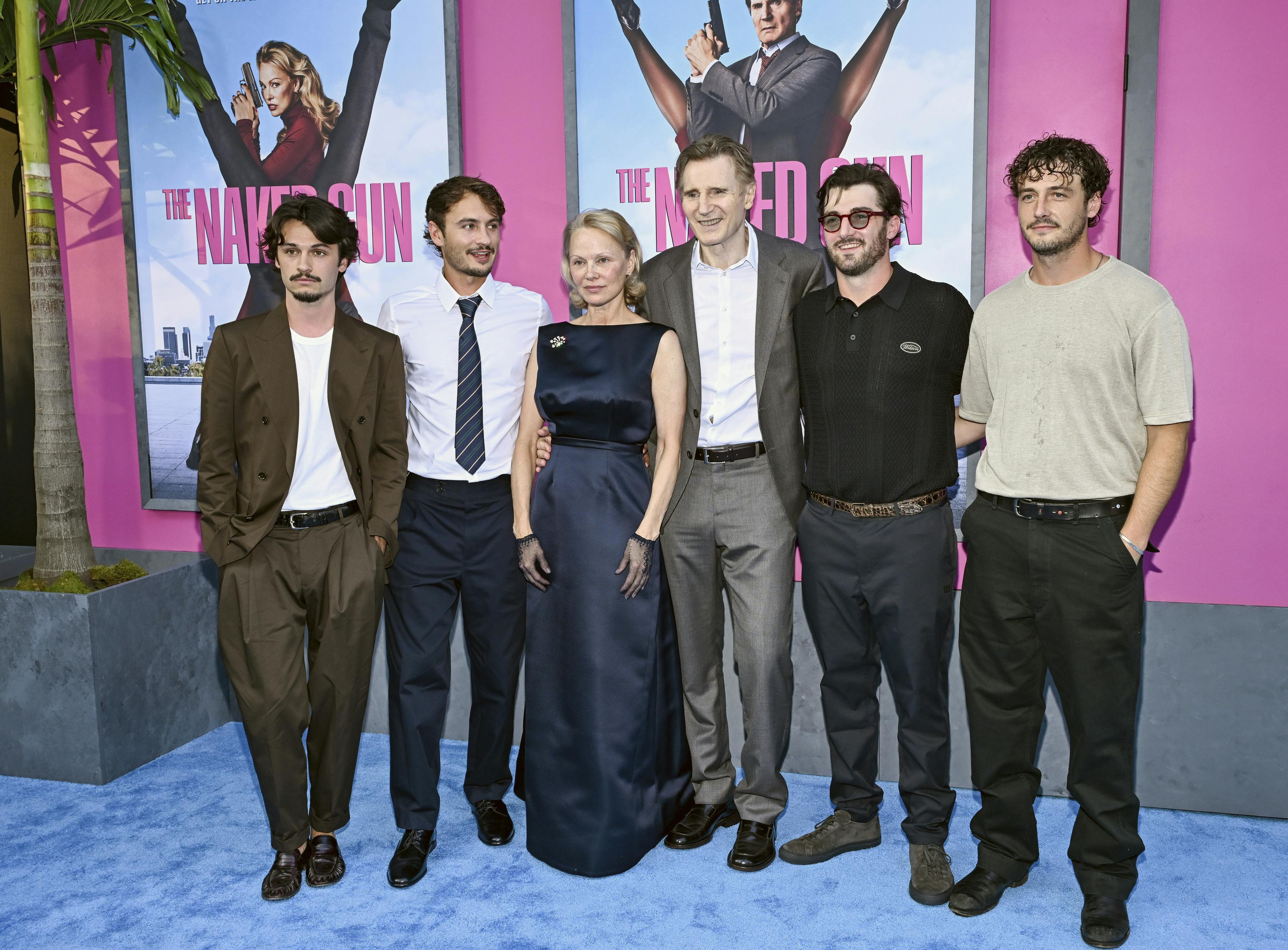 Dylan Lee, from left, Brandon Lee, Pamela Anderson, Liam Neeson, Daniel Neeson and Micheál Richardson attend the premiere of Paramount Pictures' "The Naked Gun" at the SVA Theater on Monday, July 28, 2025, in New York. (Photo by Evan Agostini/Invision/AP)