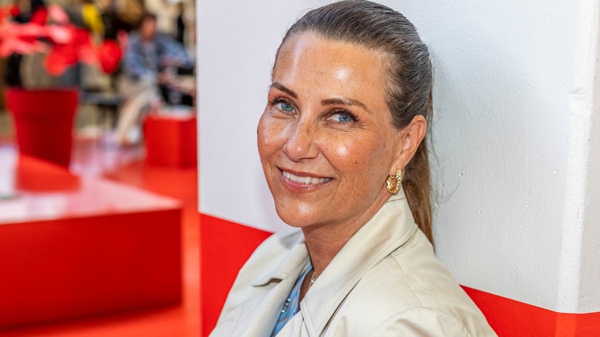 Märtha Louise med en flot glød og et stort smil på læben under årets modeuge i København. 