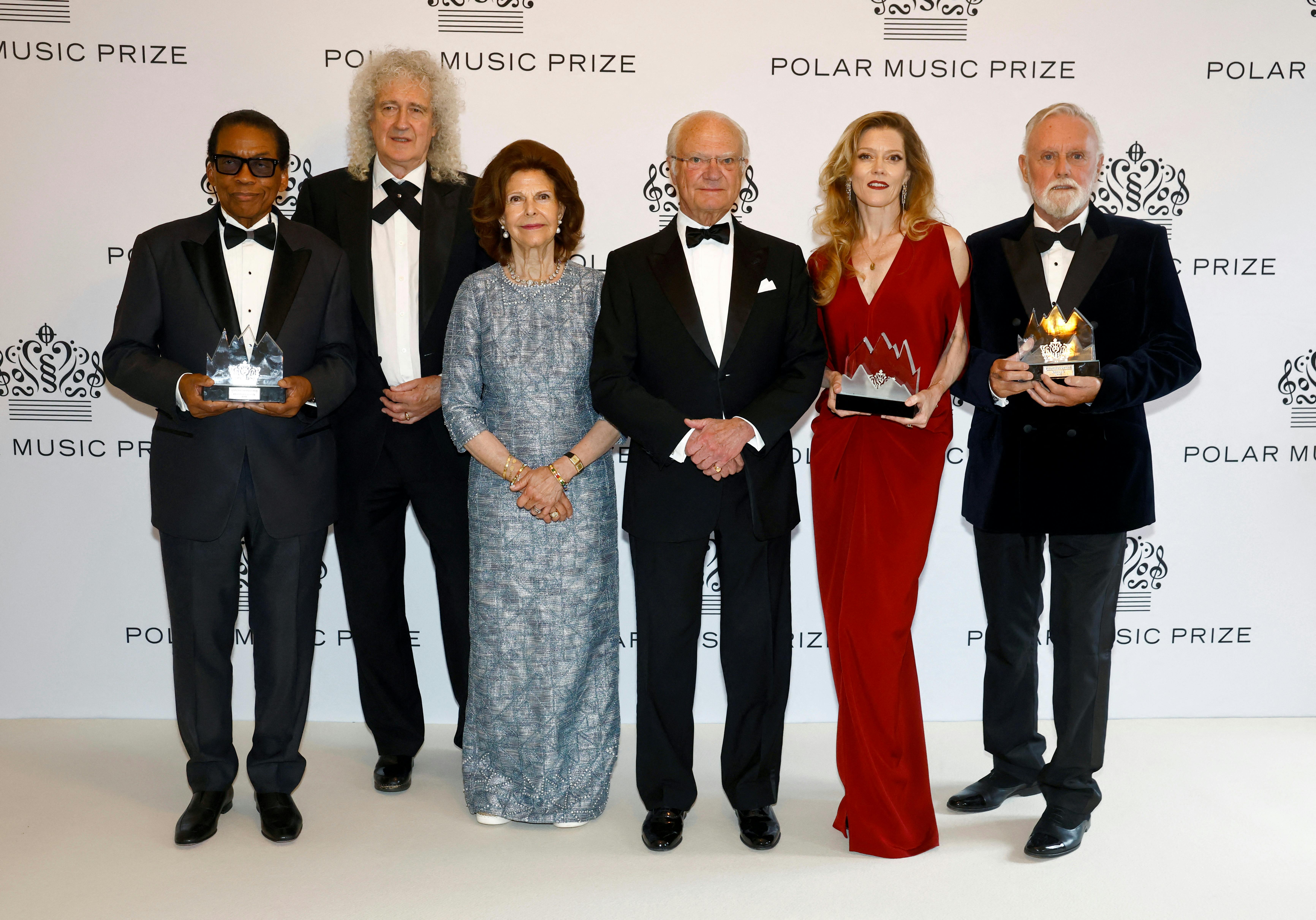American jazz musician Herbie Hancock, British rock band Queen's guitarist Brian May, Sweden's Queen Silvia, Sweden's King Carl Gustaf, Canadian soprano and conductor Barbara Hannigan and British rock band Queen's drummer Roger Taylor, pose for a picture at the Grand Hotel in Stockholm, Sweden May 27, 2025. TT News Agency/Stefan Jerrevang via REUTERS ATTENTION EDITORS - THIS IMAGE WAS PROVIDED BY A THIRD PARTY. SWEDEN OUT.NO COMMERCIAL OR EDITORIAL SALES IN SWEDEN.