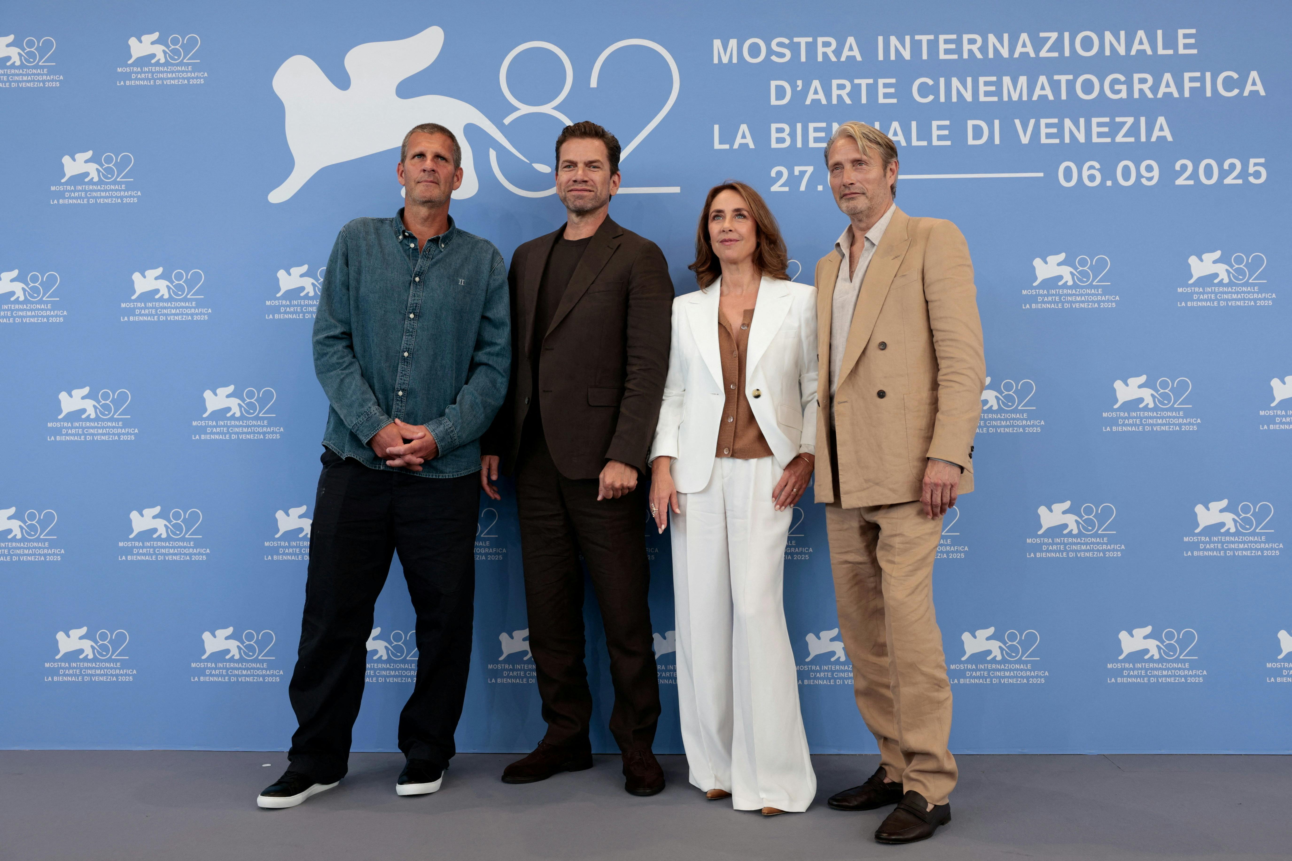 Director Anders Thomas Jensen and cast members Mads Mikkelsen, Sofie Grabol and Nikolaj Lie Kaas pose during a photocall for the movie "The Last Viking" out of competition at the 82nd Venice International Film Festival, in Venice, Italy, August 30, 2025. REUTERS/Remo Casilli