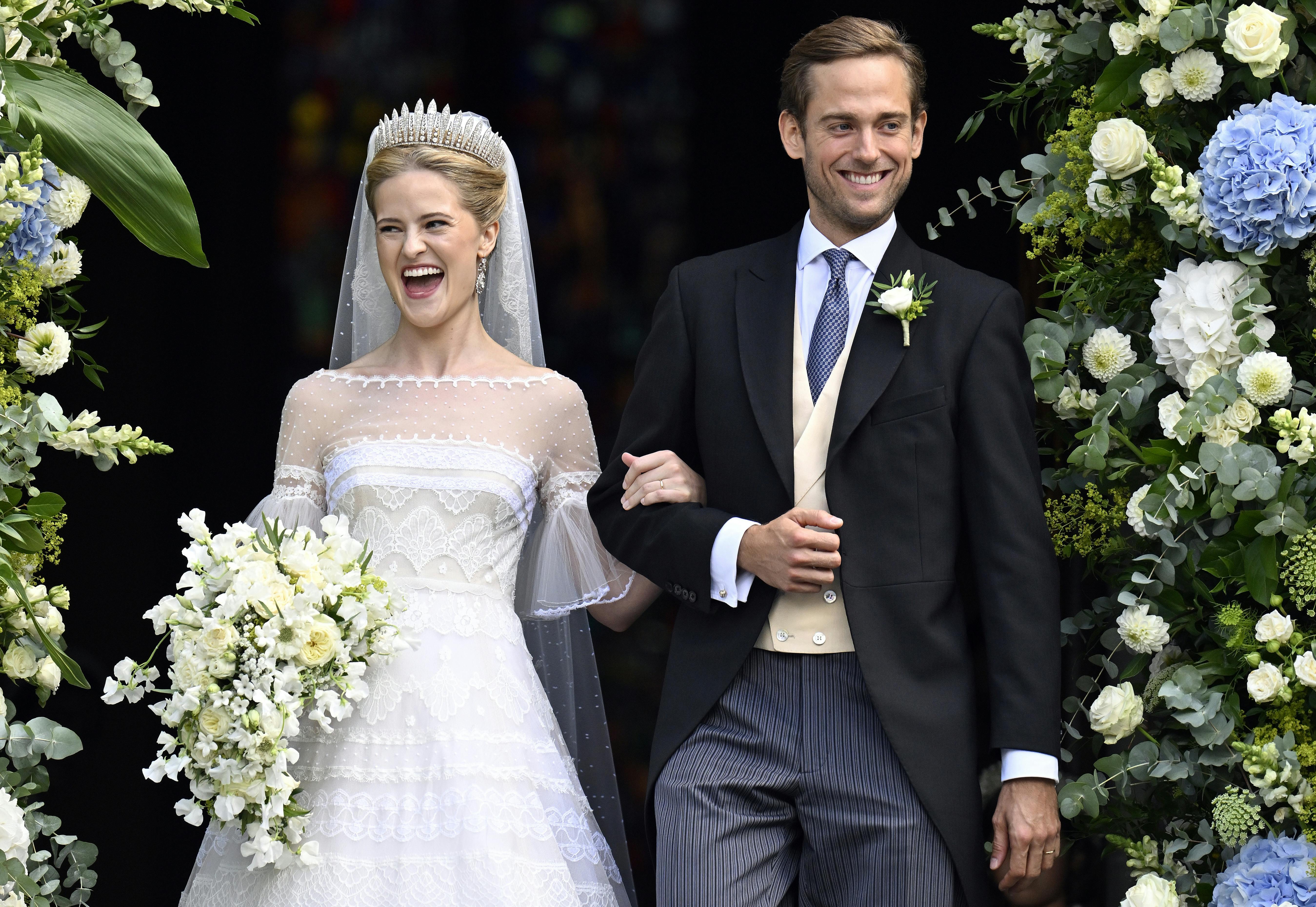 Princess Marie Caroline of Liechtenstein and Leopoldo Maduro Vollmer come out of the church after their wedding ceremony at Cathedral St. Florin in Vaduz, Liechtenstein, Saturday, Aug. 30, 2025. (Walter Bieri/Keystone via AP)